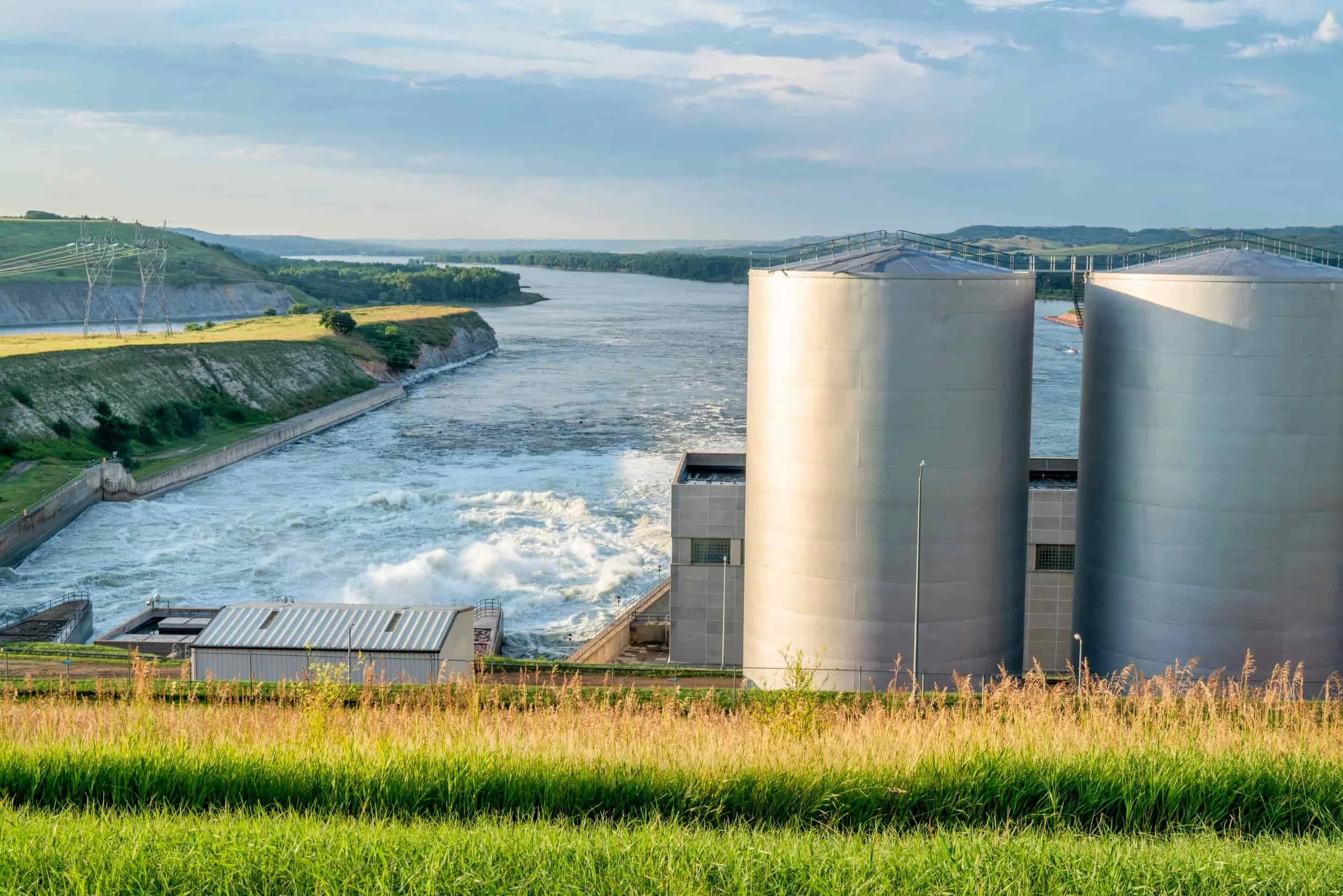 Water coming to an end where farm land begins.