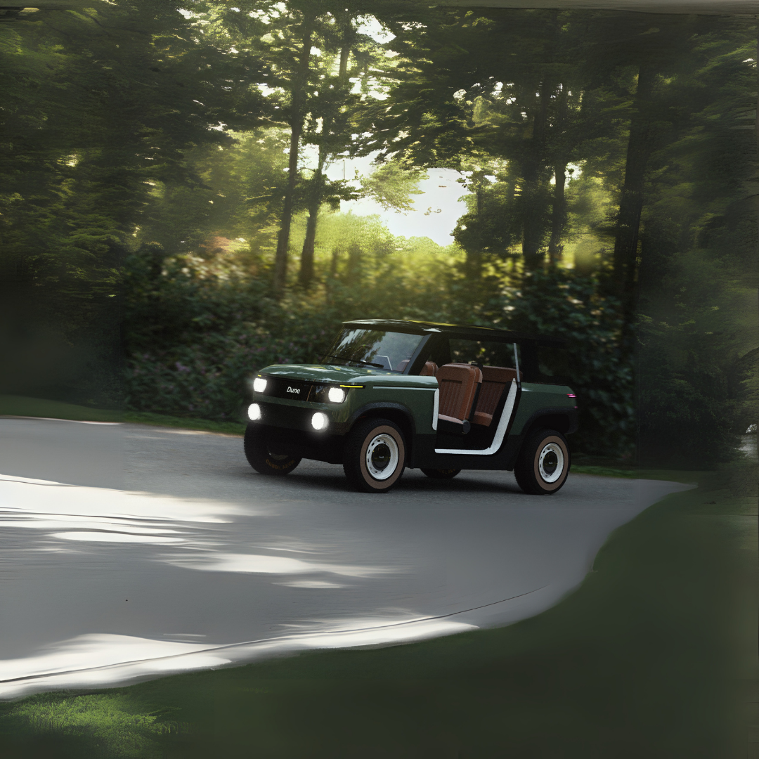 A small, vintage-style electric vehicle with open doors, painted dark green with brown seats, driving along a winding road through a lush, green forested area.