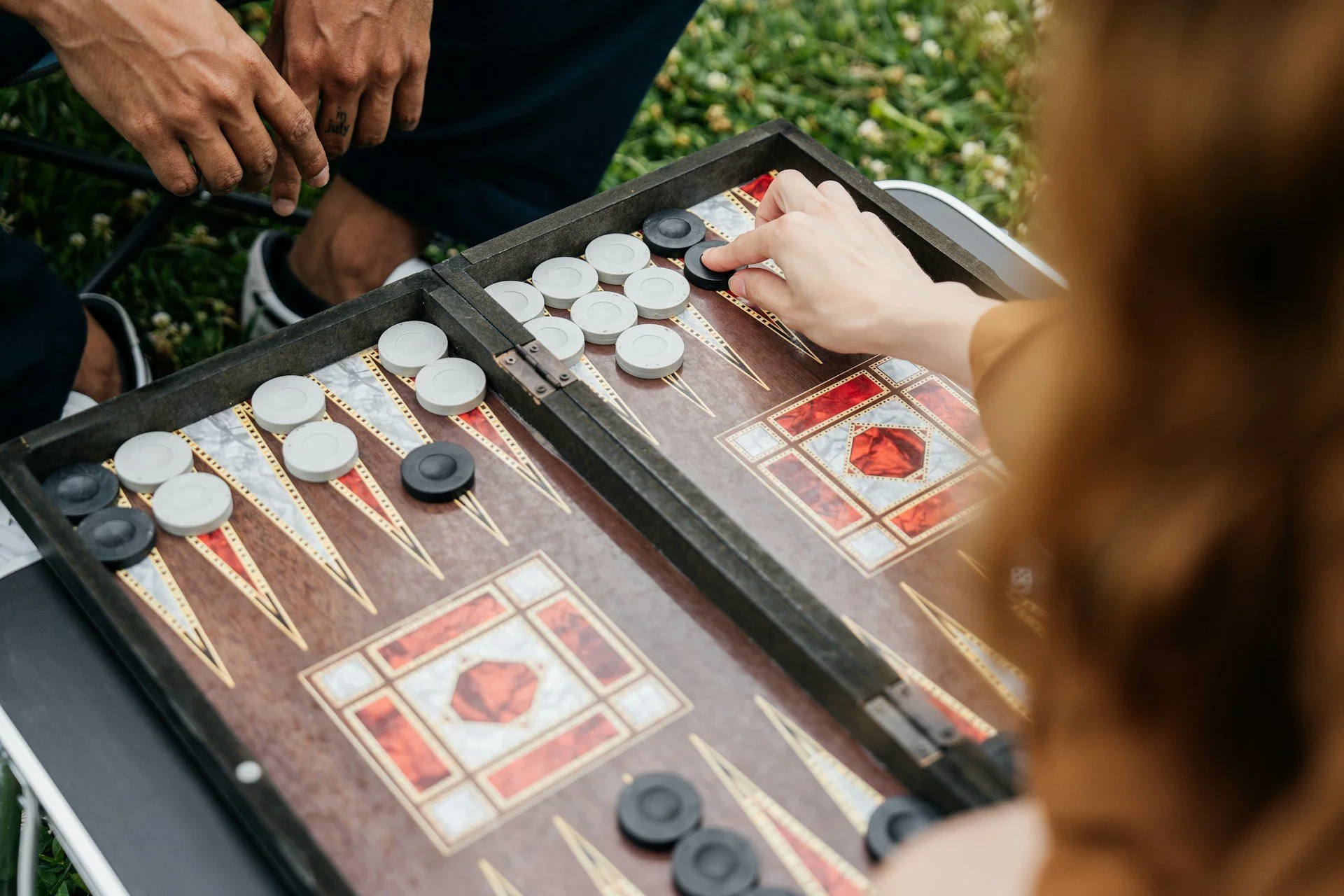 Playing Outdoor Board Games with Custom Features