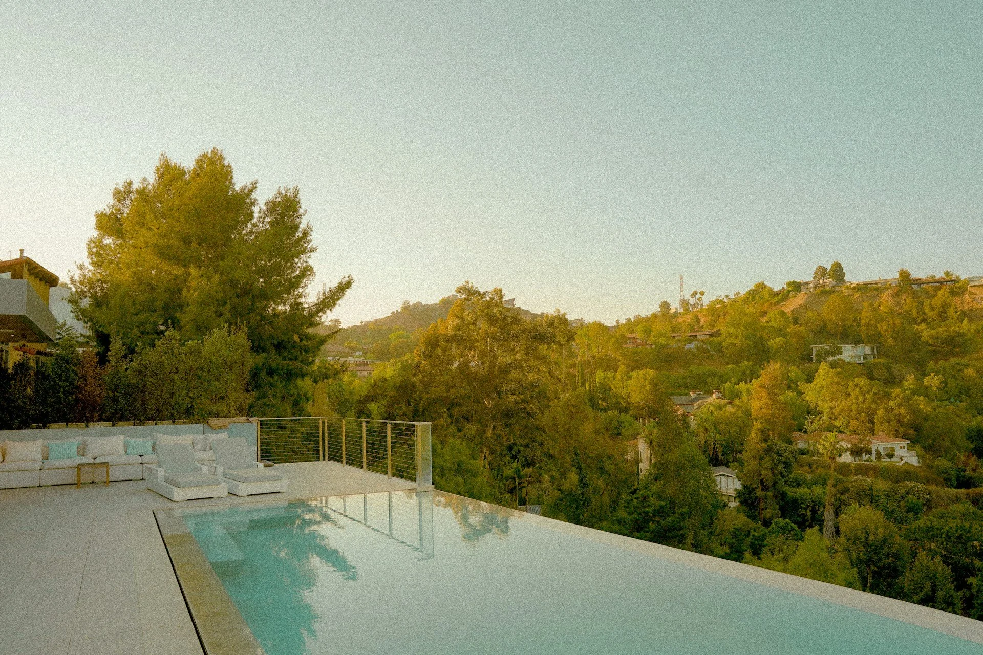 Coastal Wind Engineering for LA Pools: Reduce Evaporation and Debris