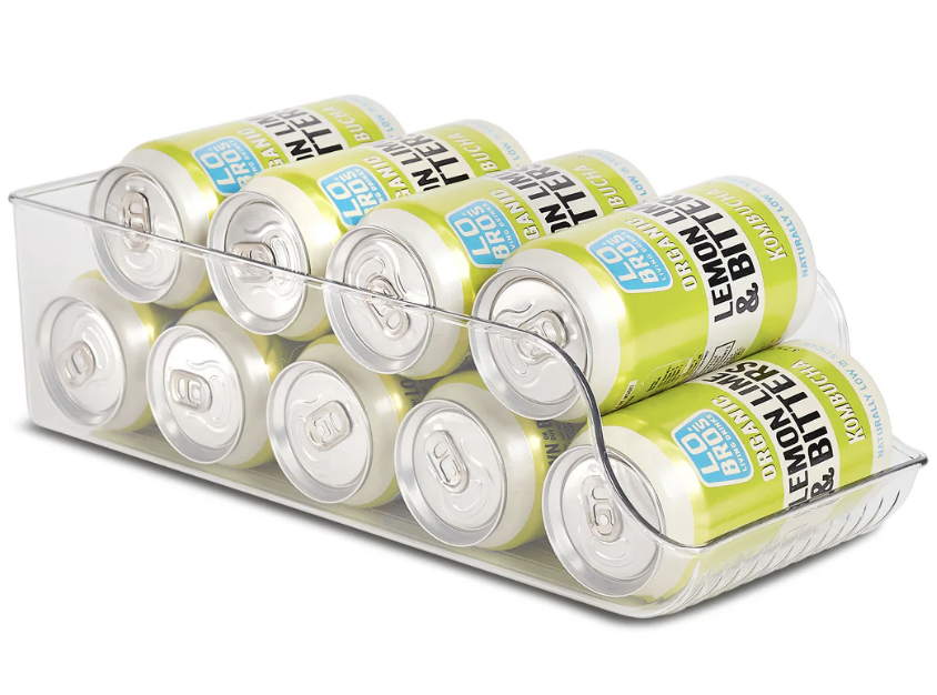 clear acrylic holder containing cans 