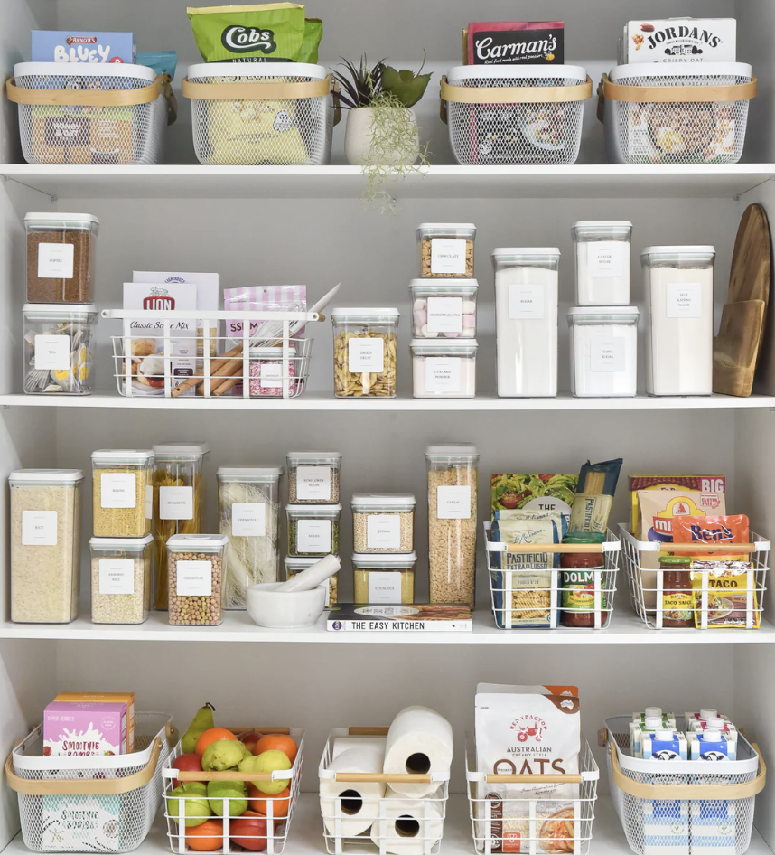 kitchen pantry with labeled jars 