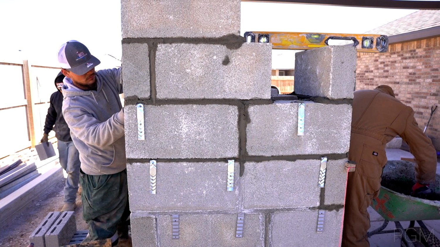 WTX crew working on outdoor spaces near pergola and patio features in Monahans, TX