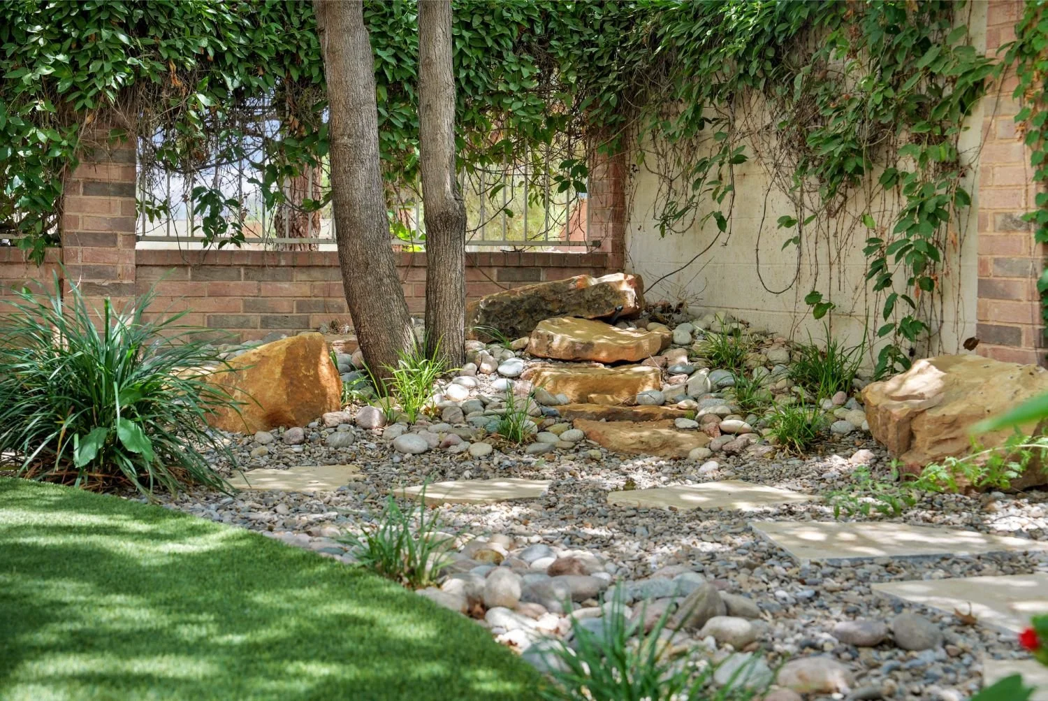 Outdoor living backyard with artificial turf in Monahans, TX