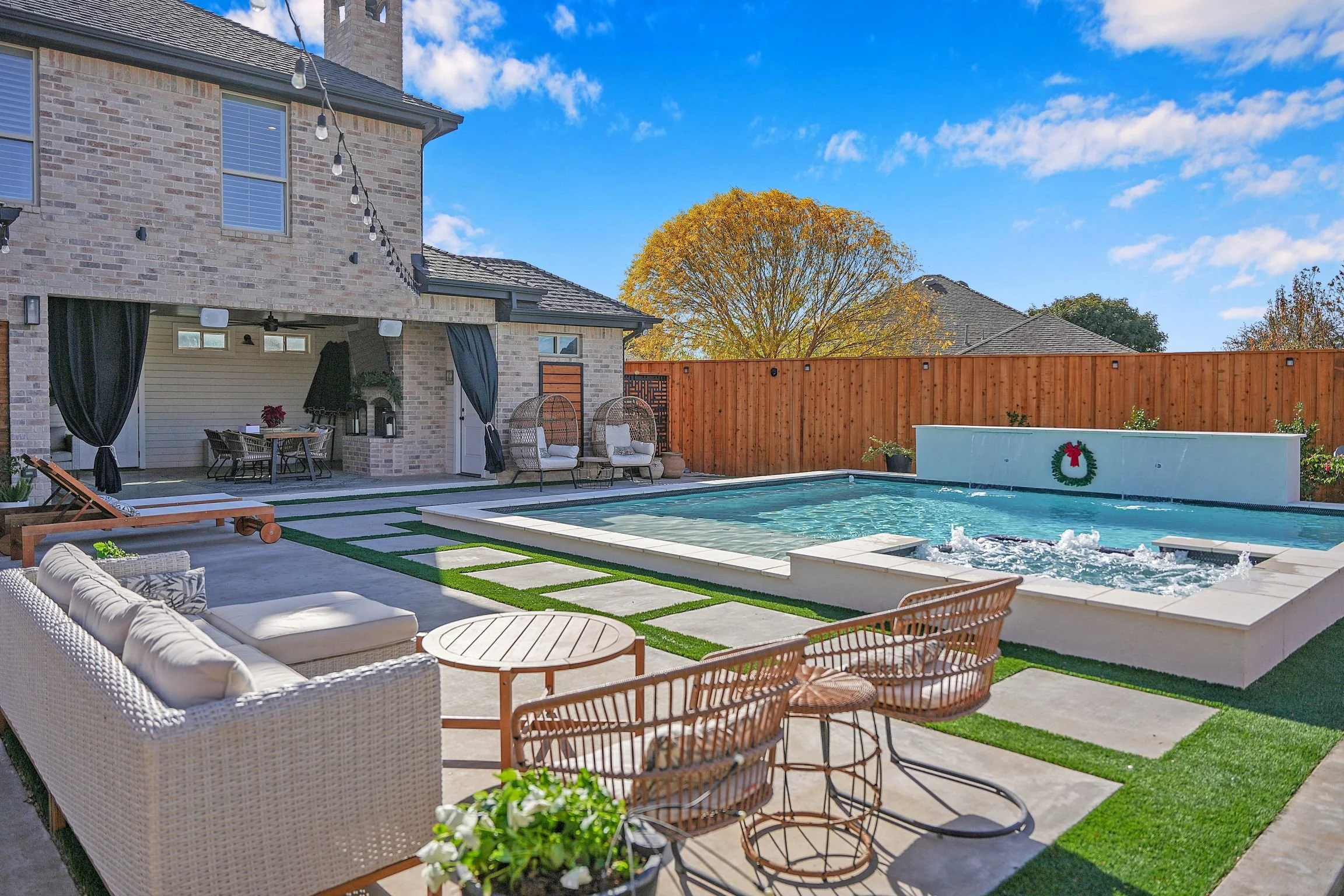 structured landscape design with native plants and stone borders in San Angelo, TX
