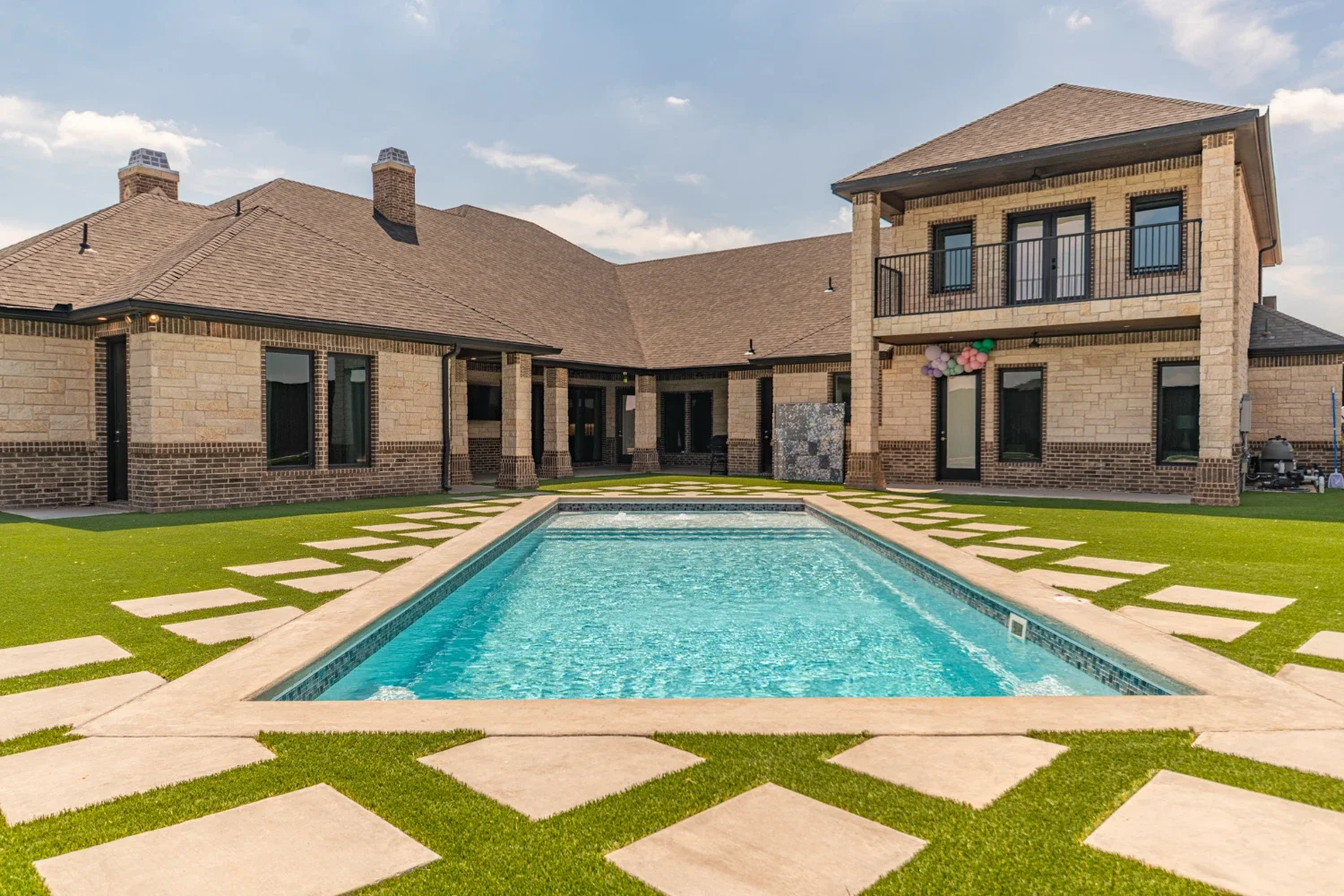 Custom pool builder near me creating backyard pool in Odessa, TX