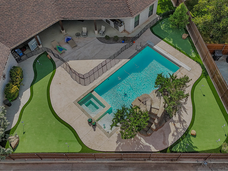 Custom pool builder near me design with modern hardscape in Odessa, TX