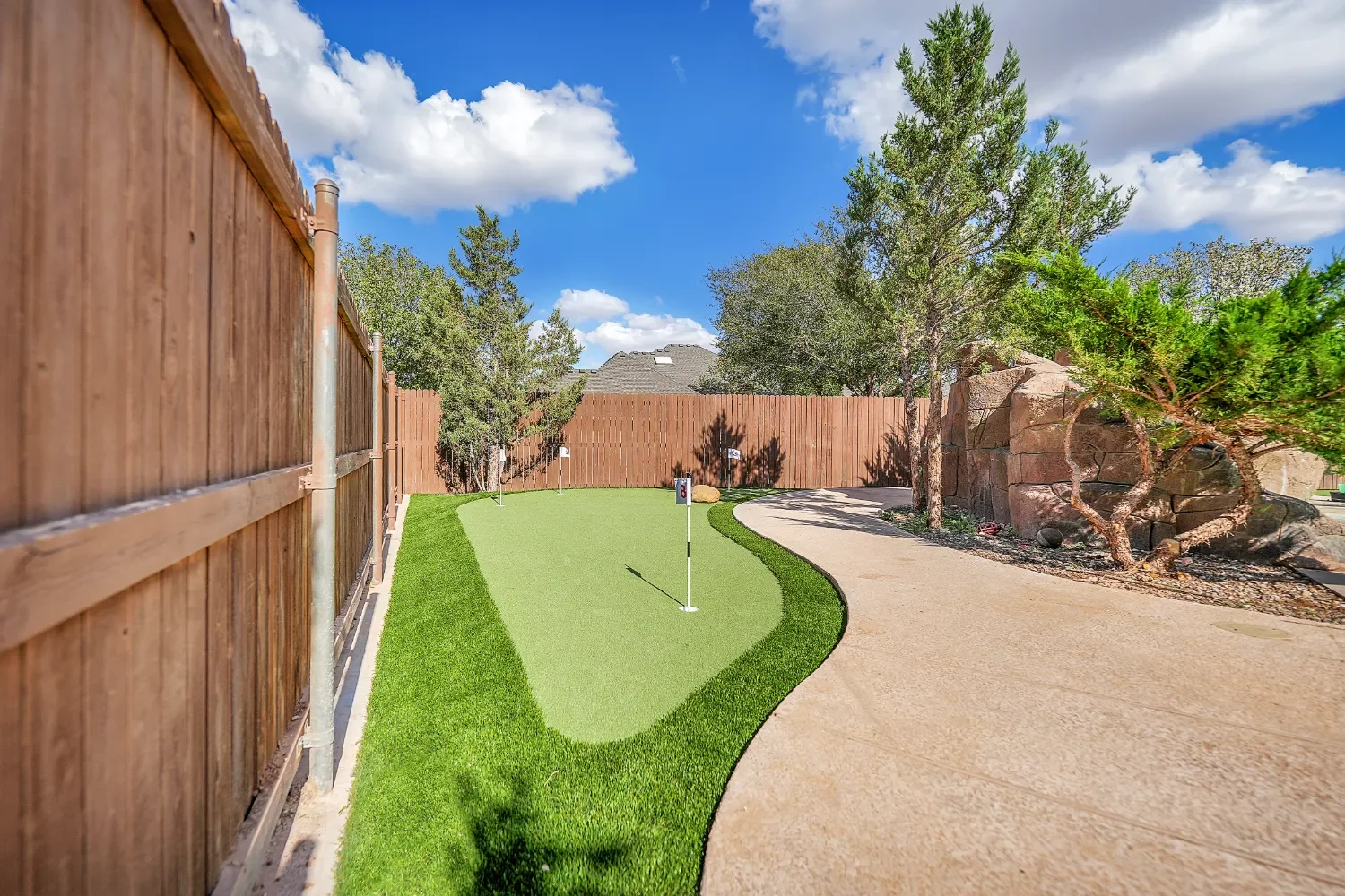 Backyard putting green built with synthetic turf in Midland, TX