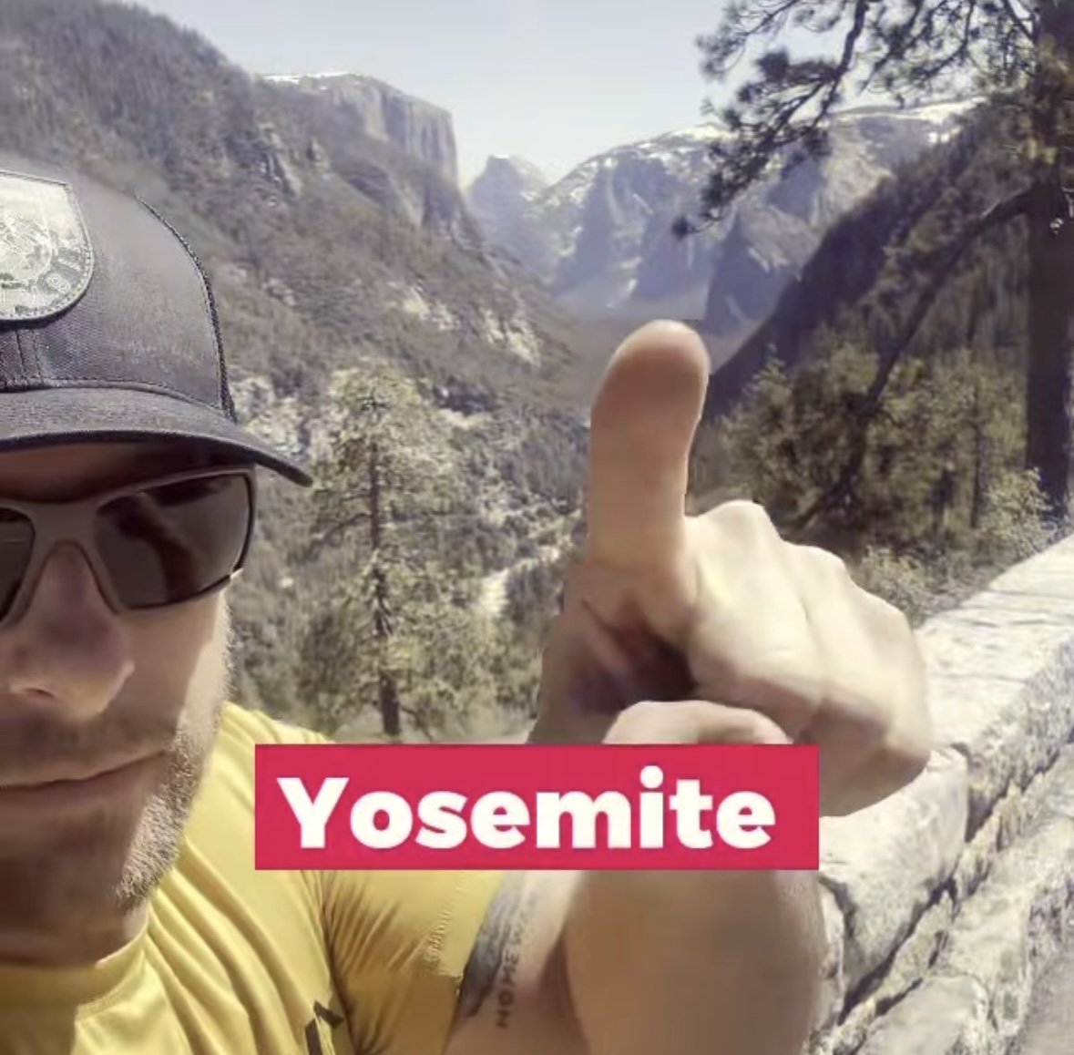 A man in sunglasses and a cap taking a selfie in front of Yosemite's mountains, giving a thumbs-up gesture. The text 'Yosemite' is overlaid on the image.