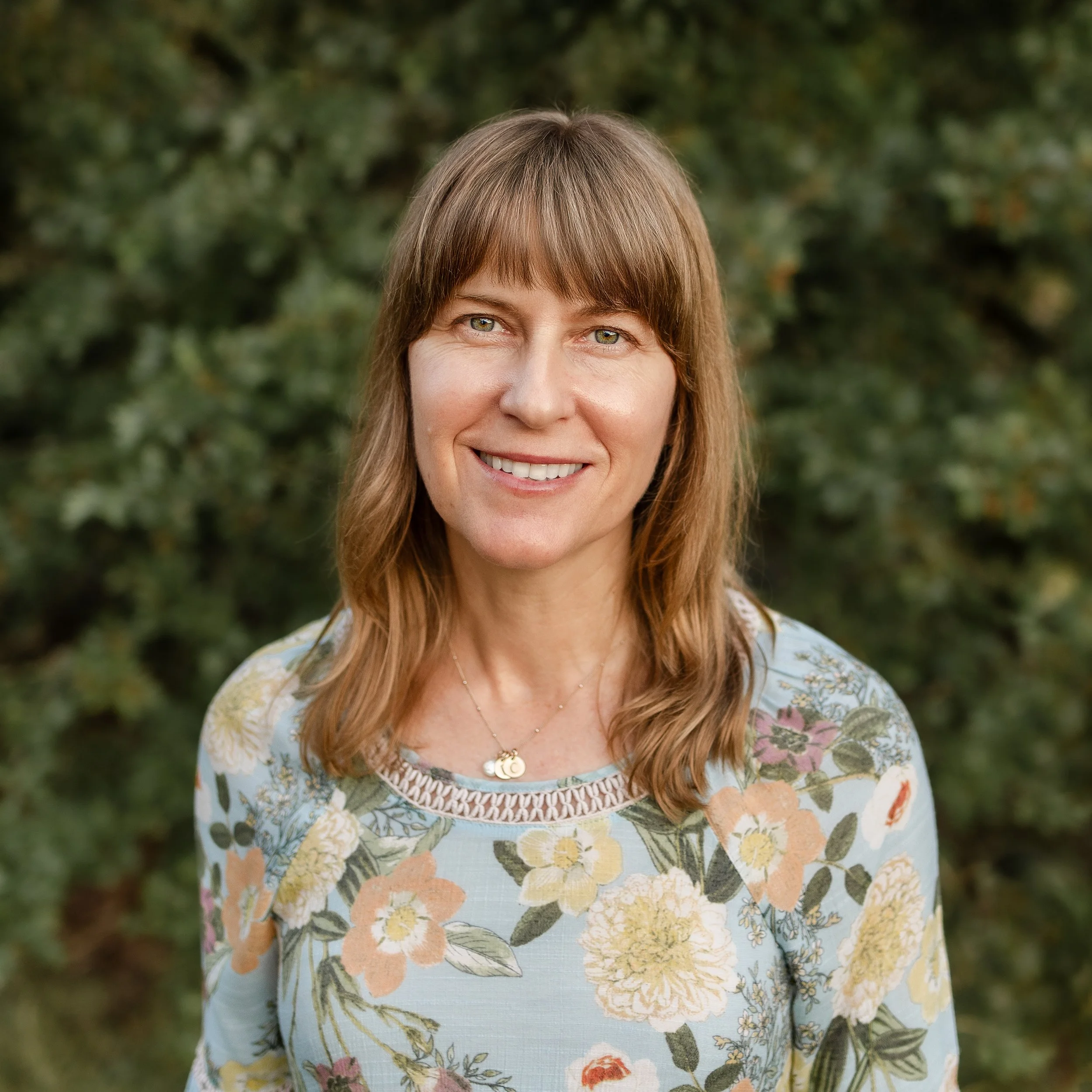 Charlotte Austin, professional organizer and holistic coach, in a calm and natural setting  4