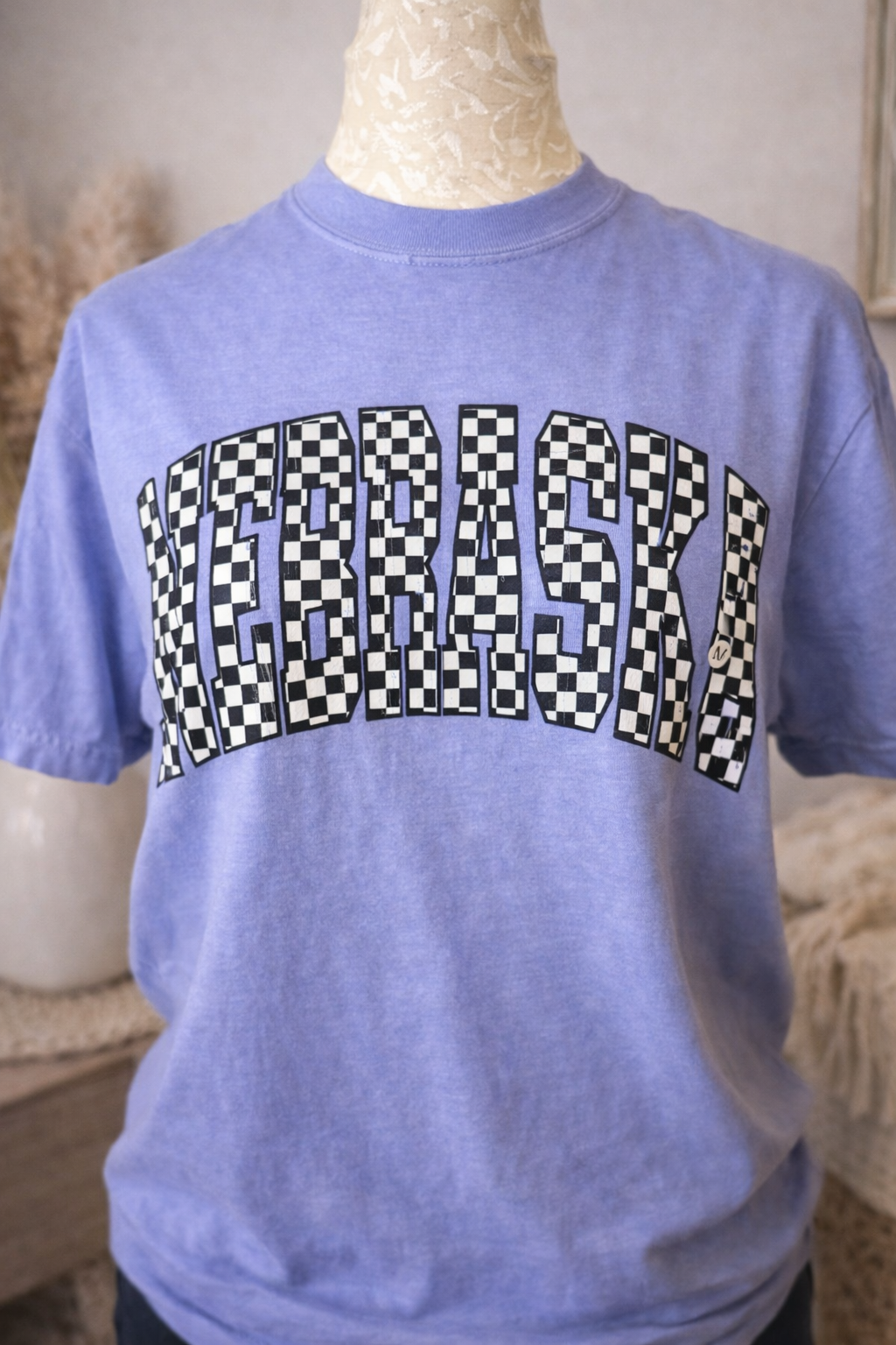 Nebraska T-shirt on mannequin bust.png
