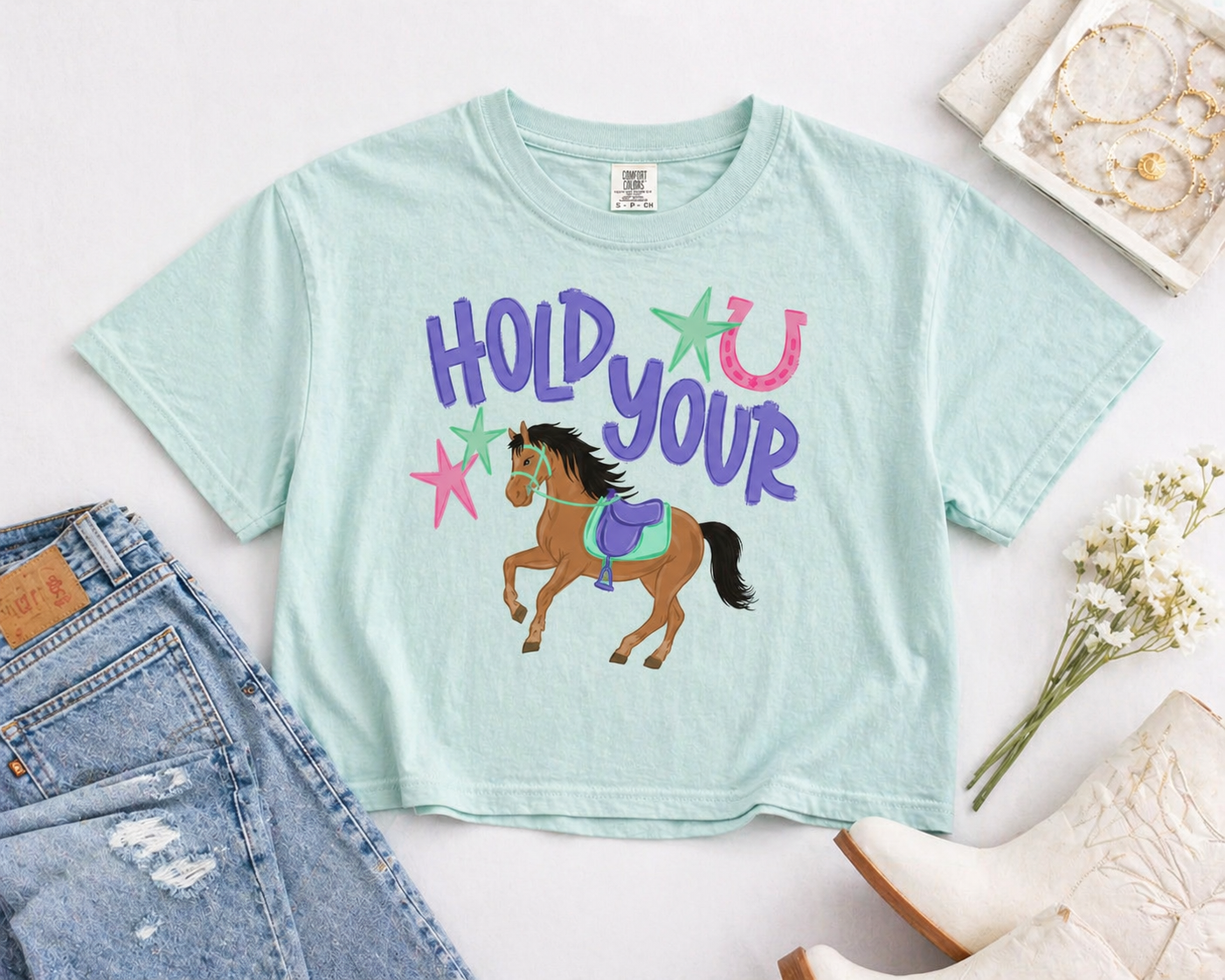 Playful mint tee with western vibes.png