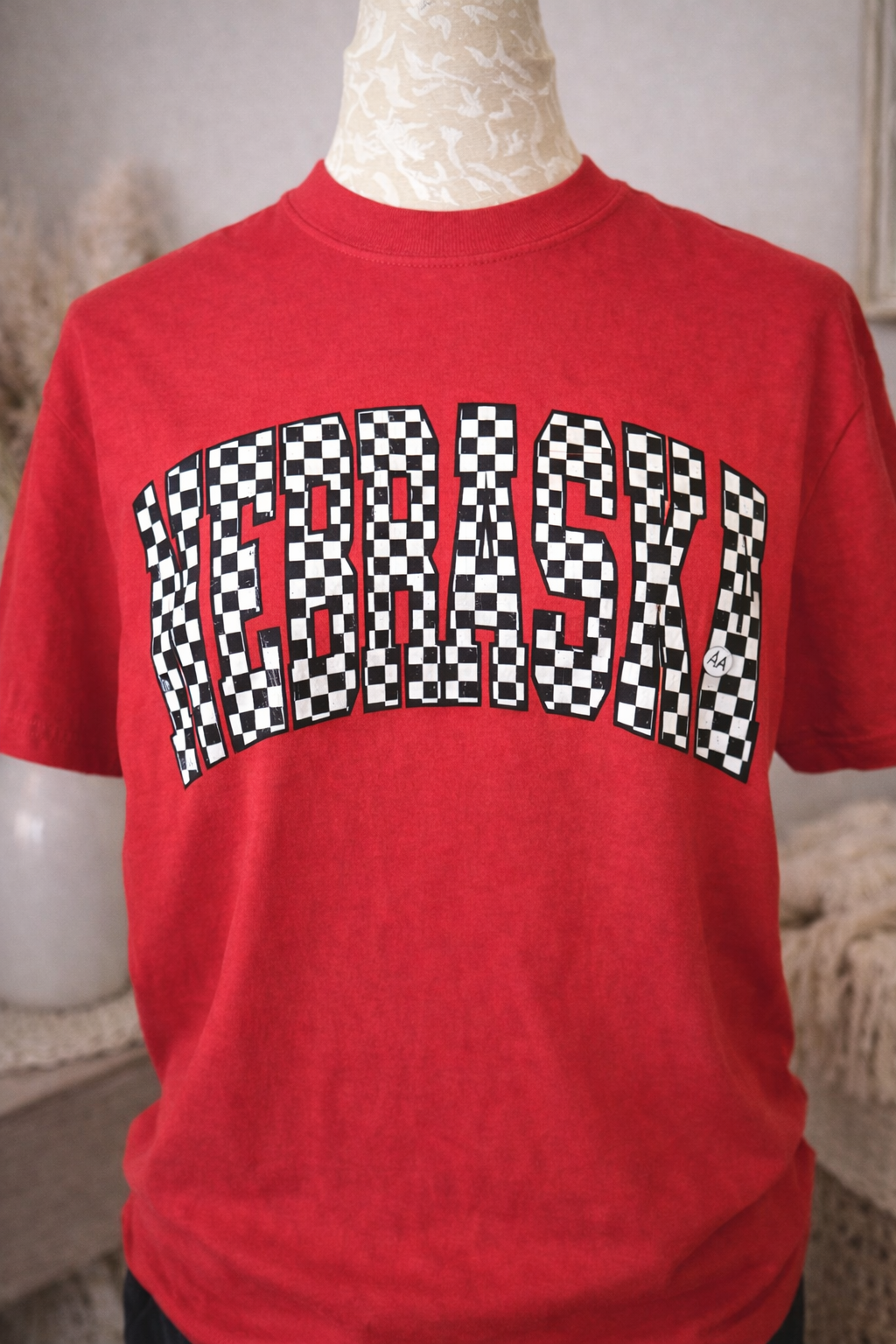 Red Nebraska T-shirt on mannequin.png
