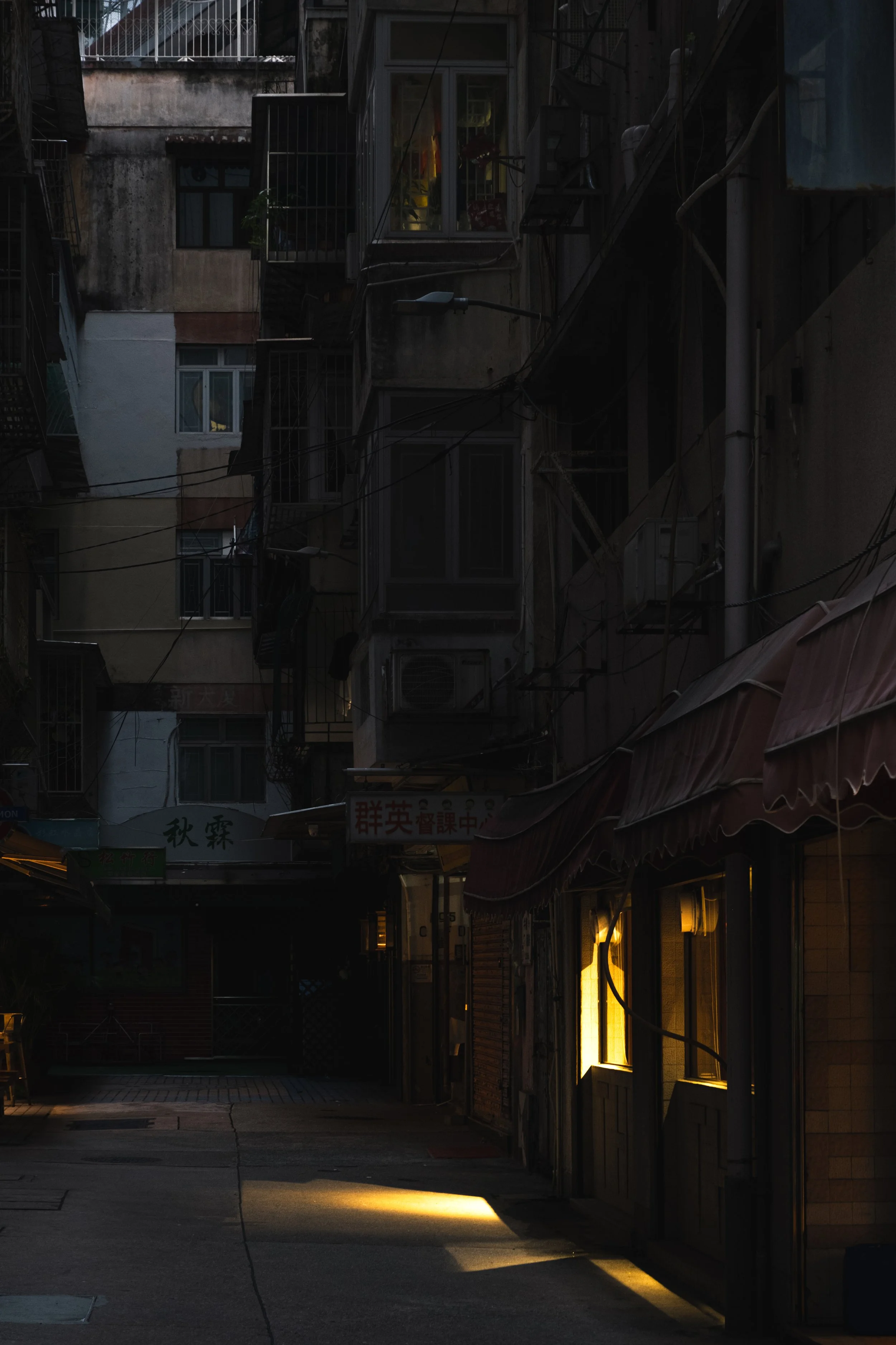 A Welcoming Light: Traveller, stop by this inviting light in a small Macau street