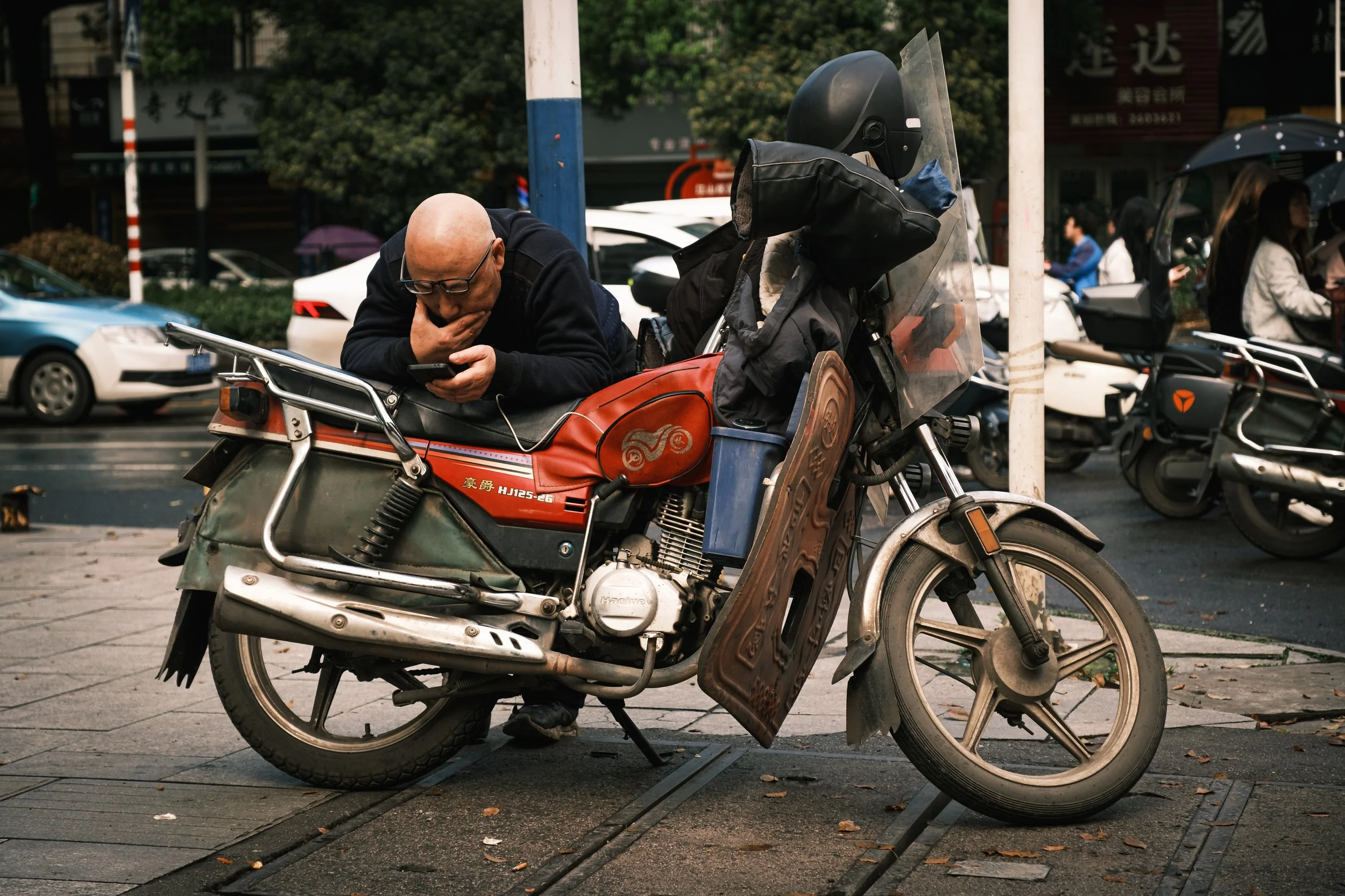 Chinese man on his motorcycle