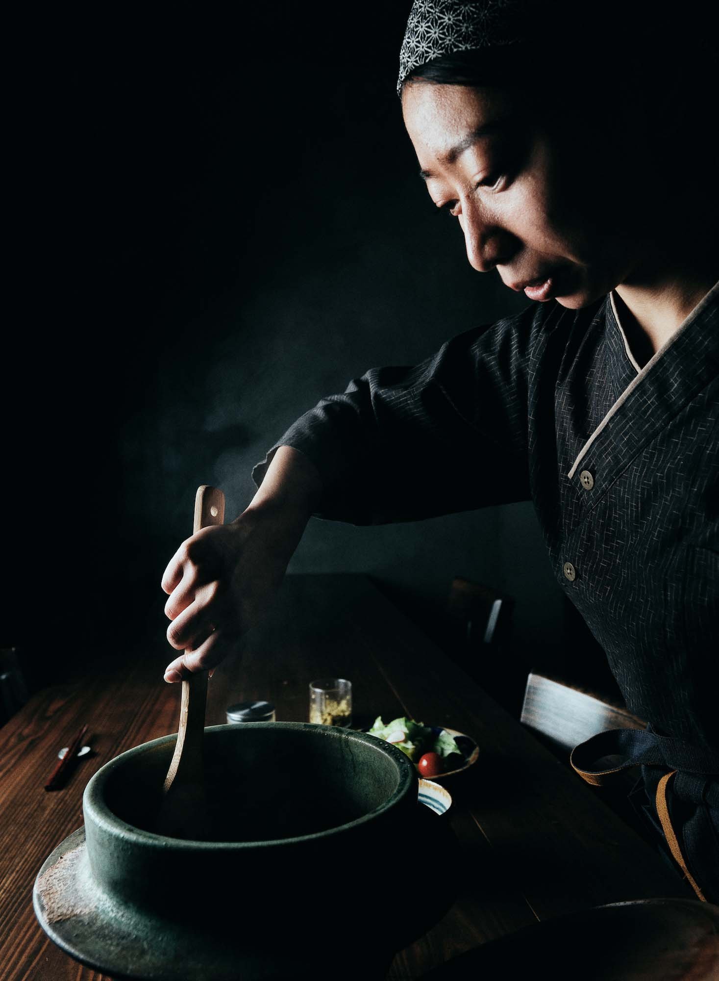 Risa Uehara, a “sherpa” guide, prepares breakfast at Nammei Shinshitsu Yambaru Hotel.