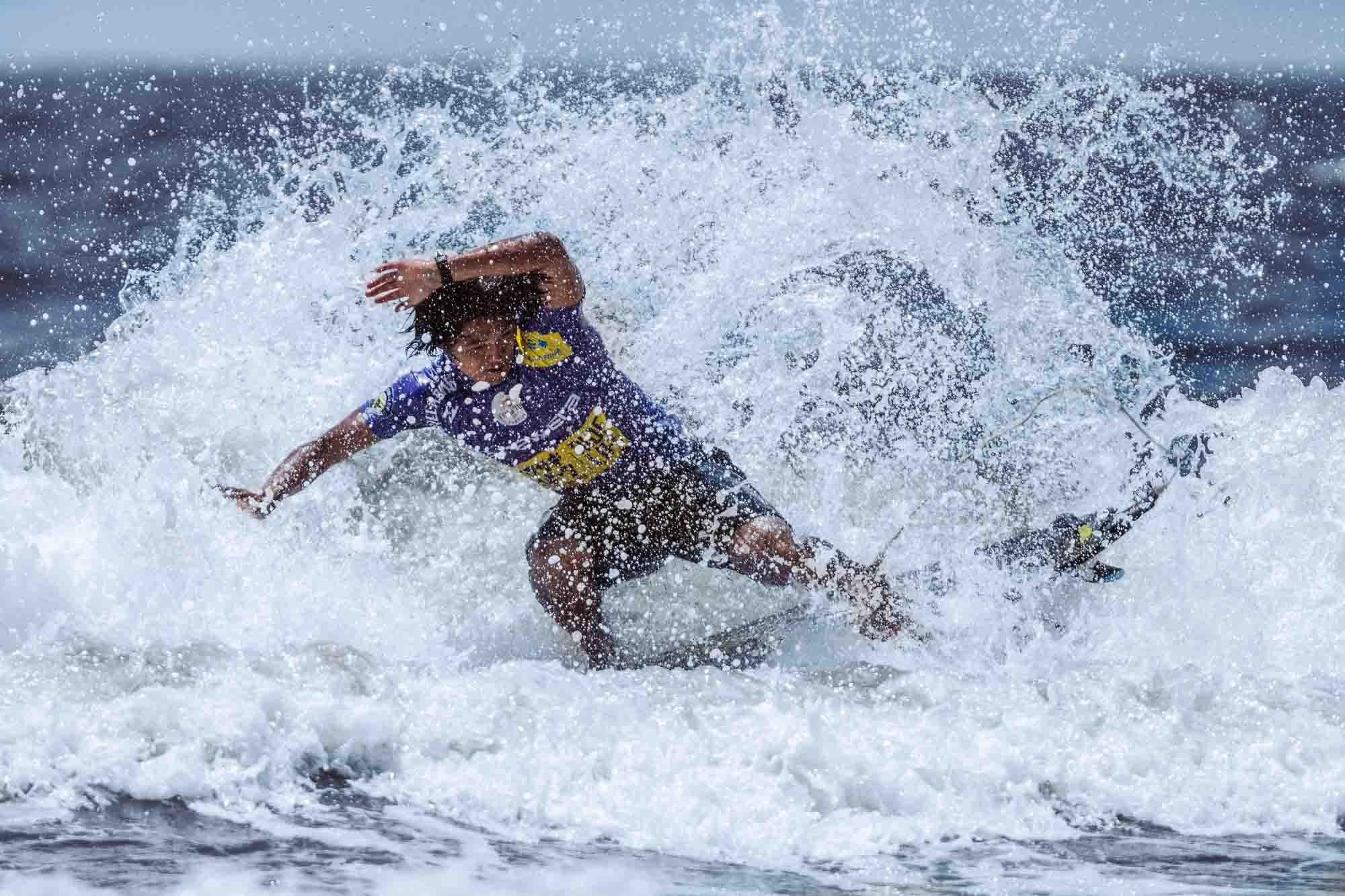 Surfer Rui Horikoshi competes in the Surfing Shortboard Contest at the Murasaki Shonan Open in Fujisawa, southwest of Tokyo. (Photo by Ben Weller/AFLO)