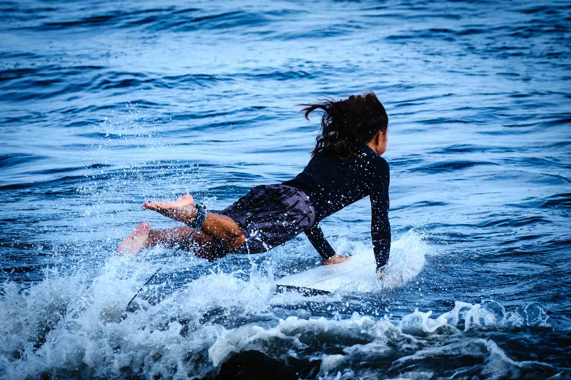 A surfer at Tsujido Beach, Fujisawa.