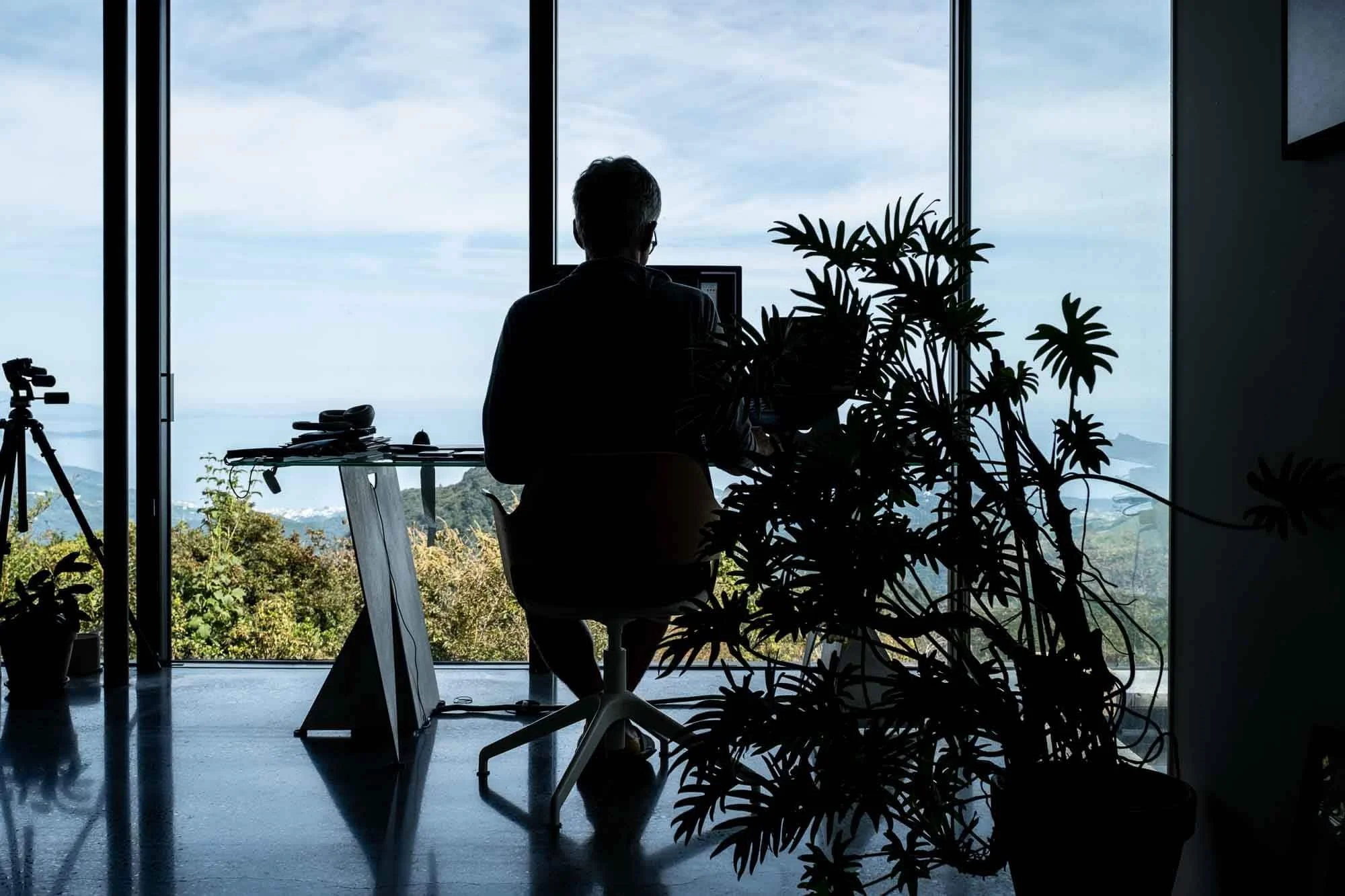  Thevenin works at his desk, with expansive views of the Izu Peninsula. 