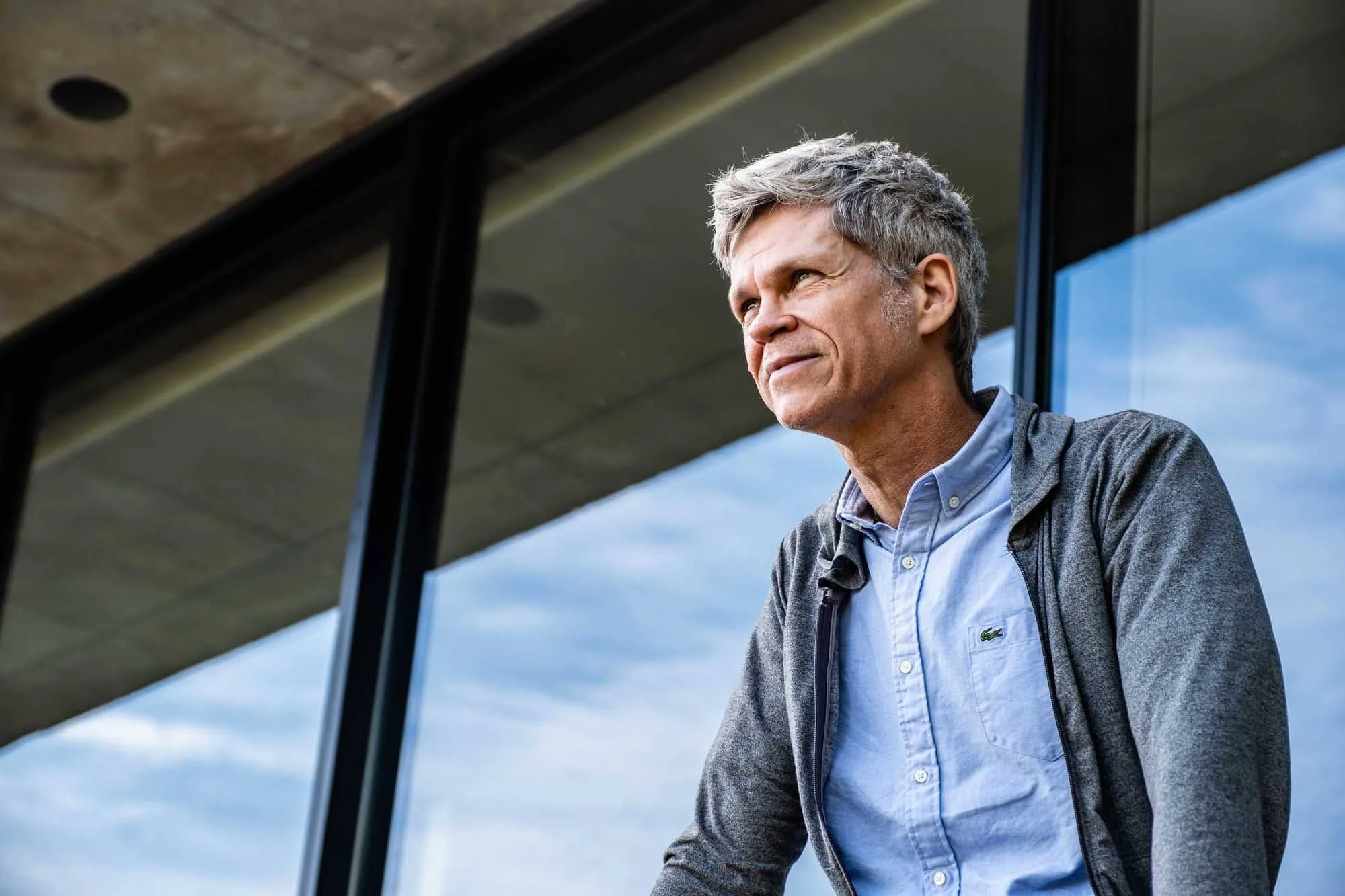  David Thevenin photographed sitting on the home’s engawa-inspired terrace for  The Wall Street Journal ’s Mansions section. 