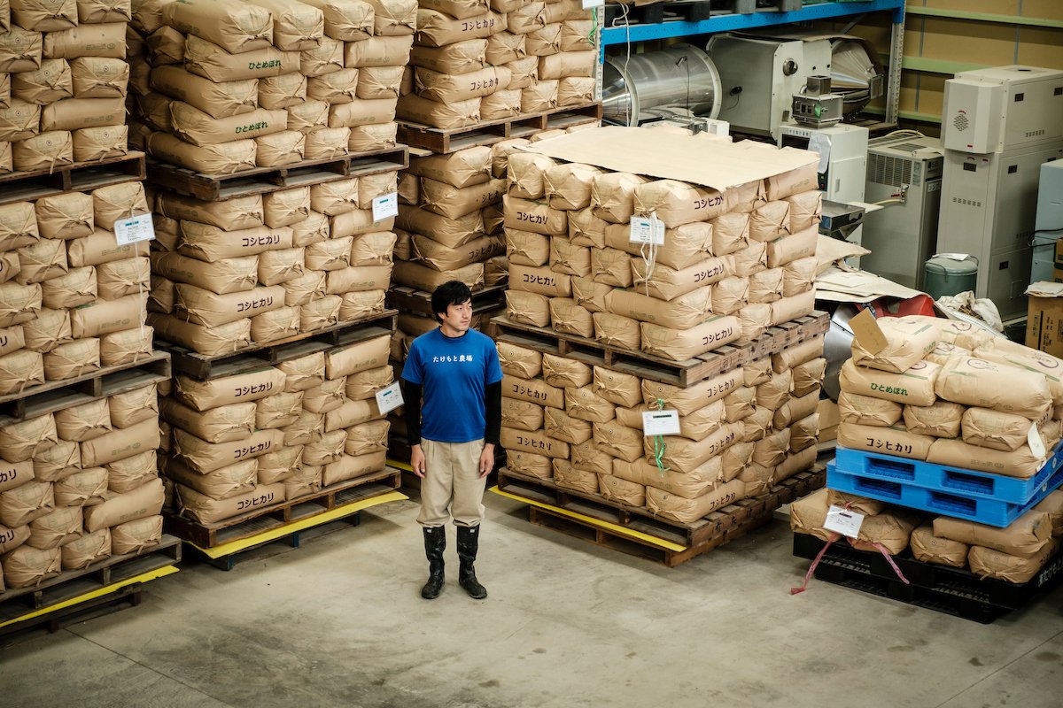  Shogo Takemoto in the warehouse at his family's rice farm in Nomi, Ishikawa, Japan. Ben Weller for The Wall Street Journal  