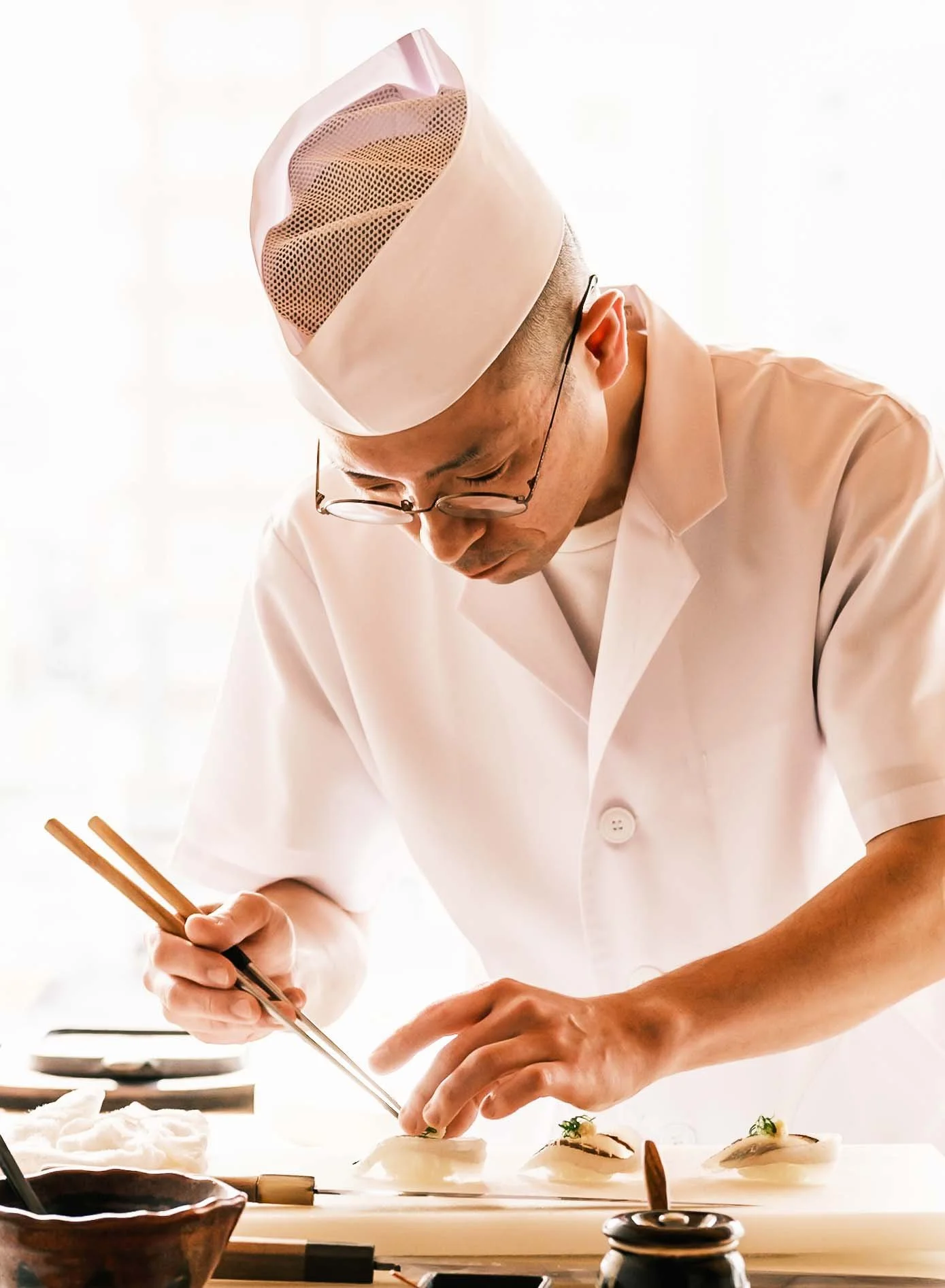 Sushi chef Takahiro Ikebuchi of Ajiroya Honten, Hiroshima, Japan. Photograph by Japan travel photographer Ben Weller for Setouchi Tourism Authority.