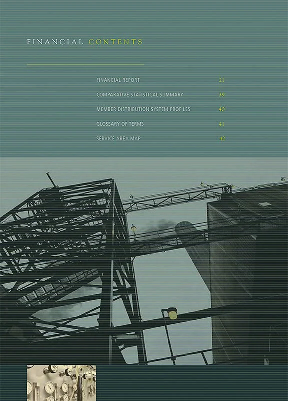 Table of contents page from a corporate annual report with yellow and white text on a blue background, featuring a black metal structure and crane at the bottom.