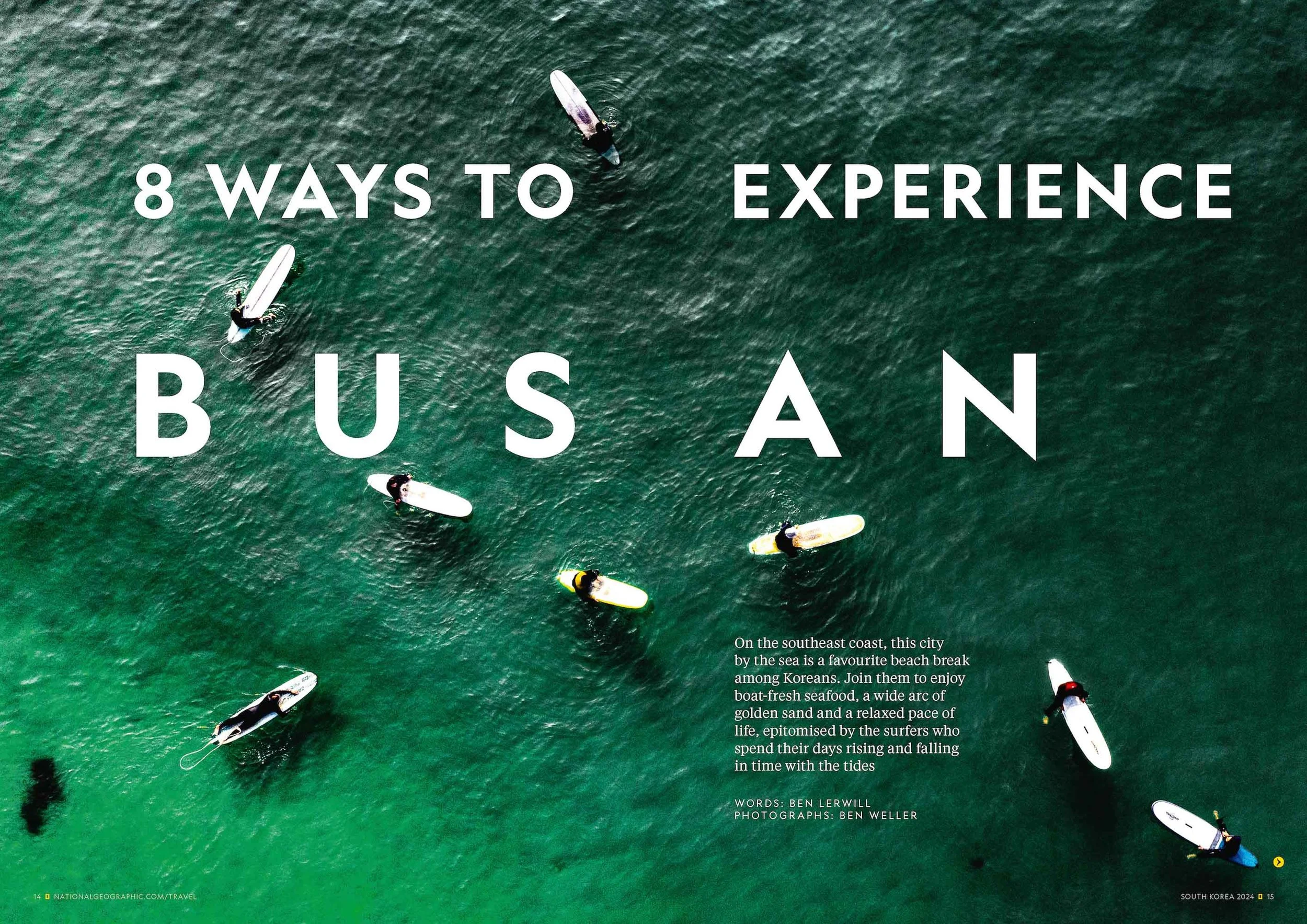 An aerial view of surfers at Songjeong Beach in Busan, Korea.