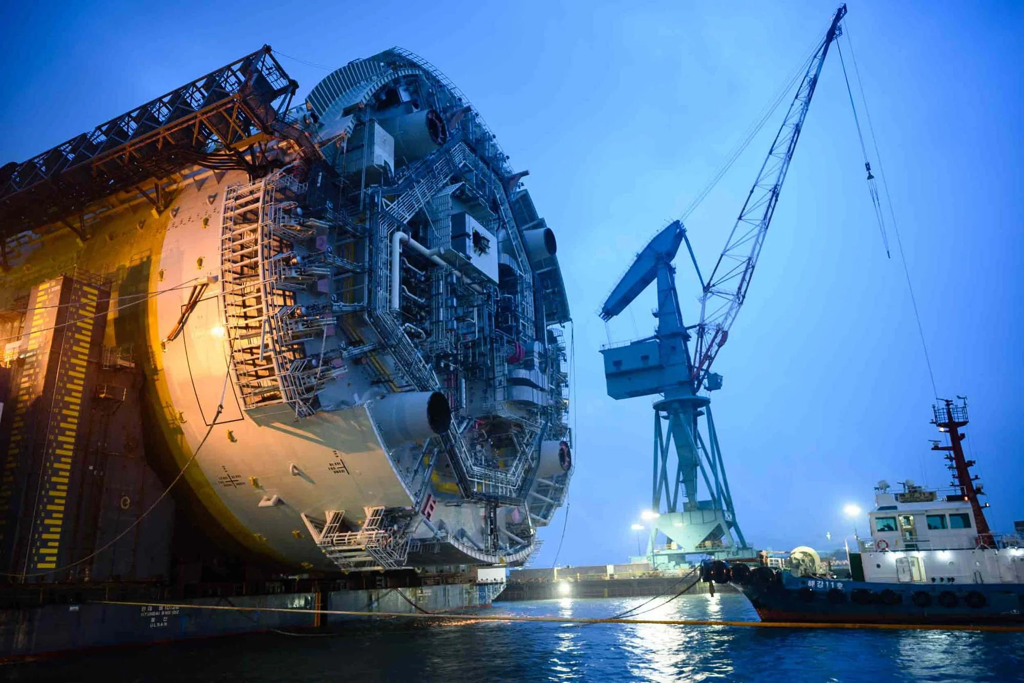 Large offshore oil and gas spar being readied for sailaway at a shipyard in South Korea.