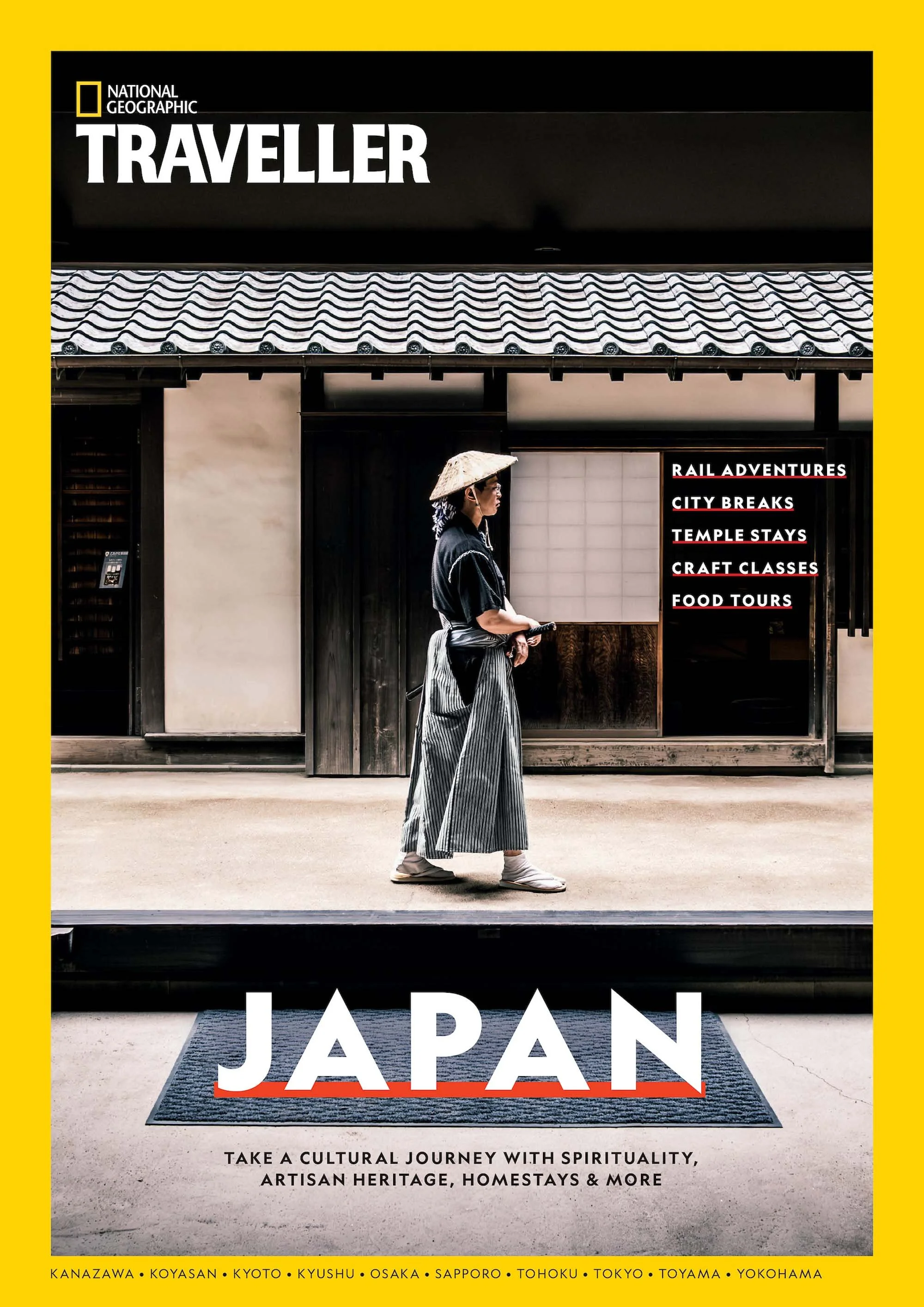 Cover of a travel magazine titled 'Japan' from National Geographic Traveler, featuring a man in traditional Japanese attire walking past a building with Japanese architectural elements and a black sign with white text, on a yellow border.