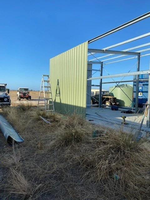 The shed getting built.