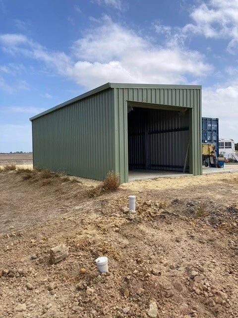 The shed getting built.