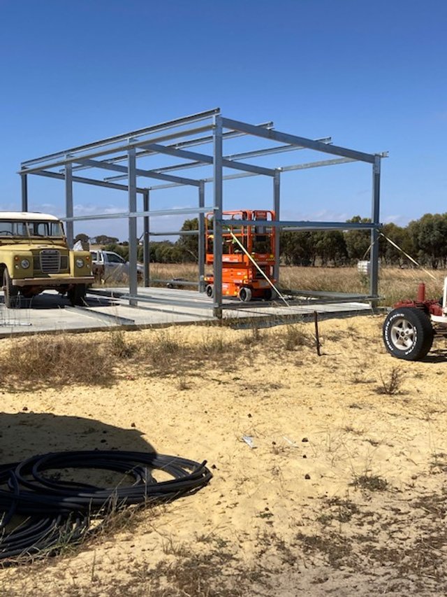 The shed getting built.