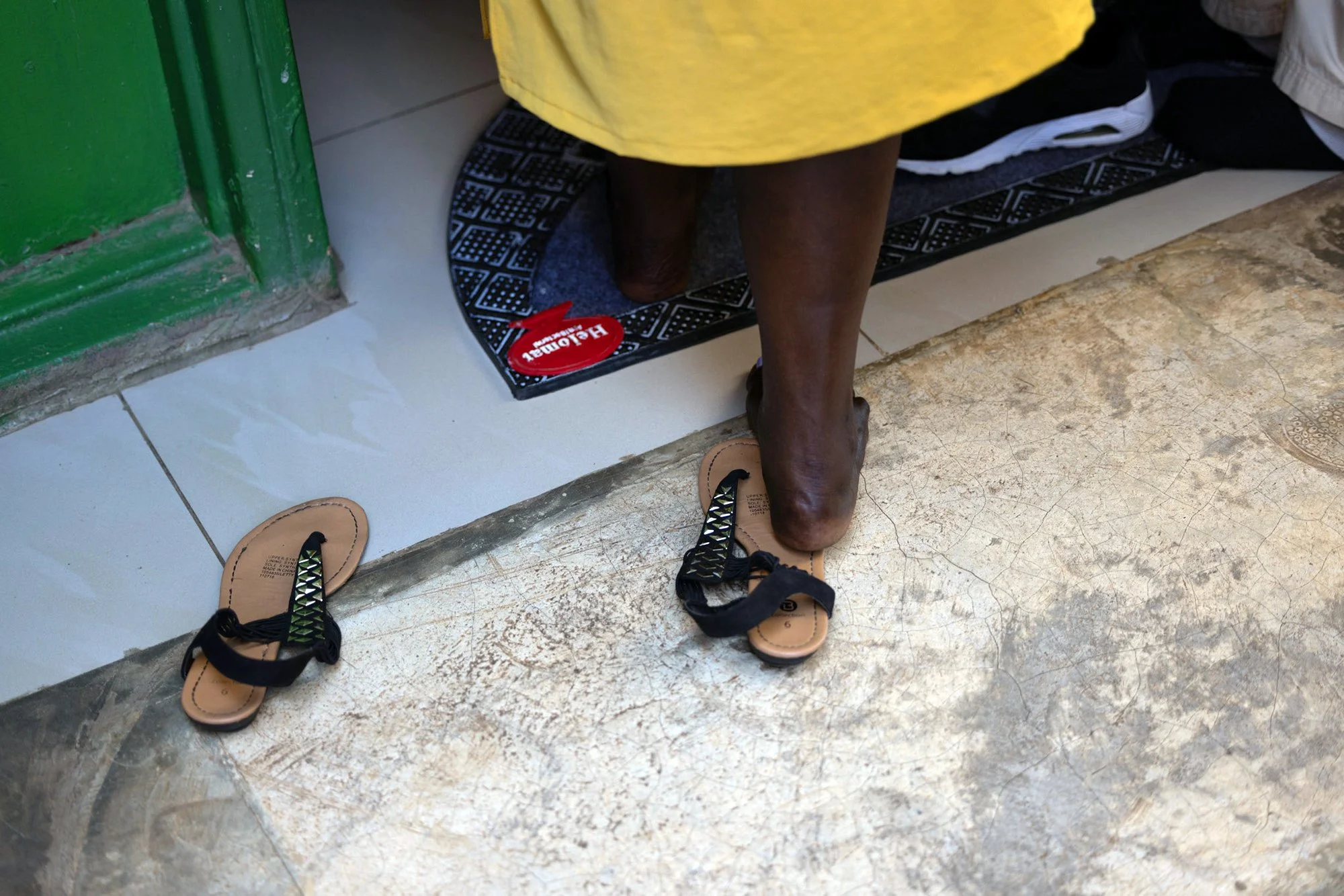 Mary Nyangoma, founder of Nyamirambo Women’s center, arrives home after work on July, 9, 2024, in Kigali, Rwanda. 
