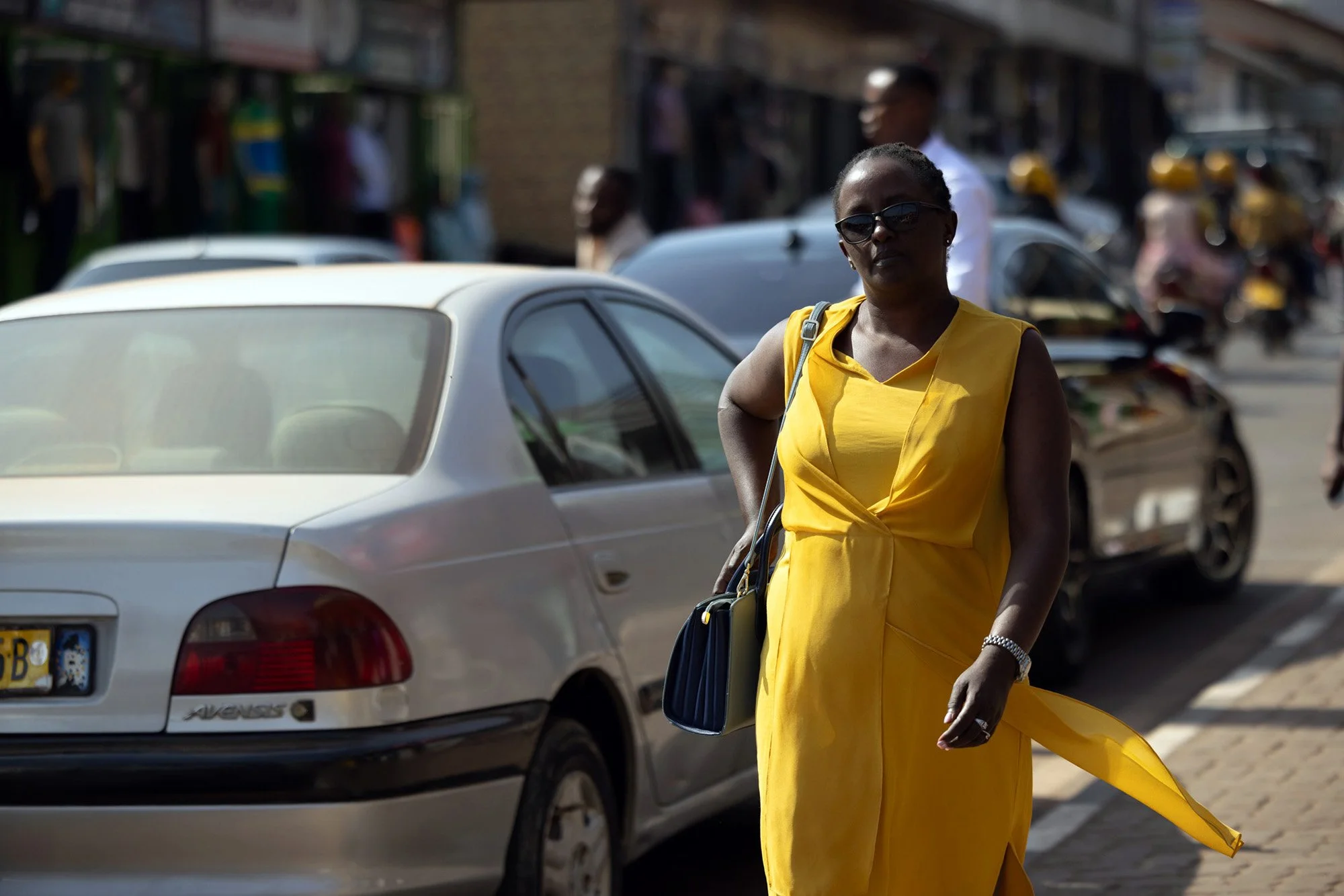 Mary Nyangoma, founder of Nyamirambo Women’s center, walking home from work on July 9, 2024, in Kigali, Rwanda. 