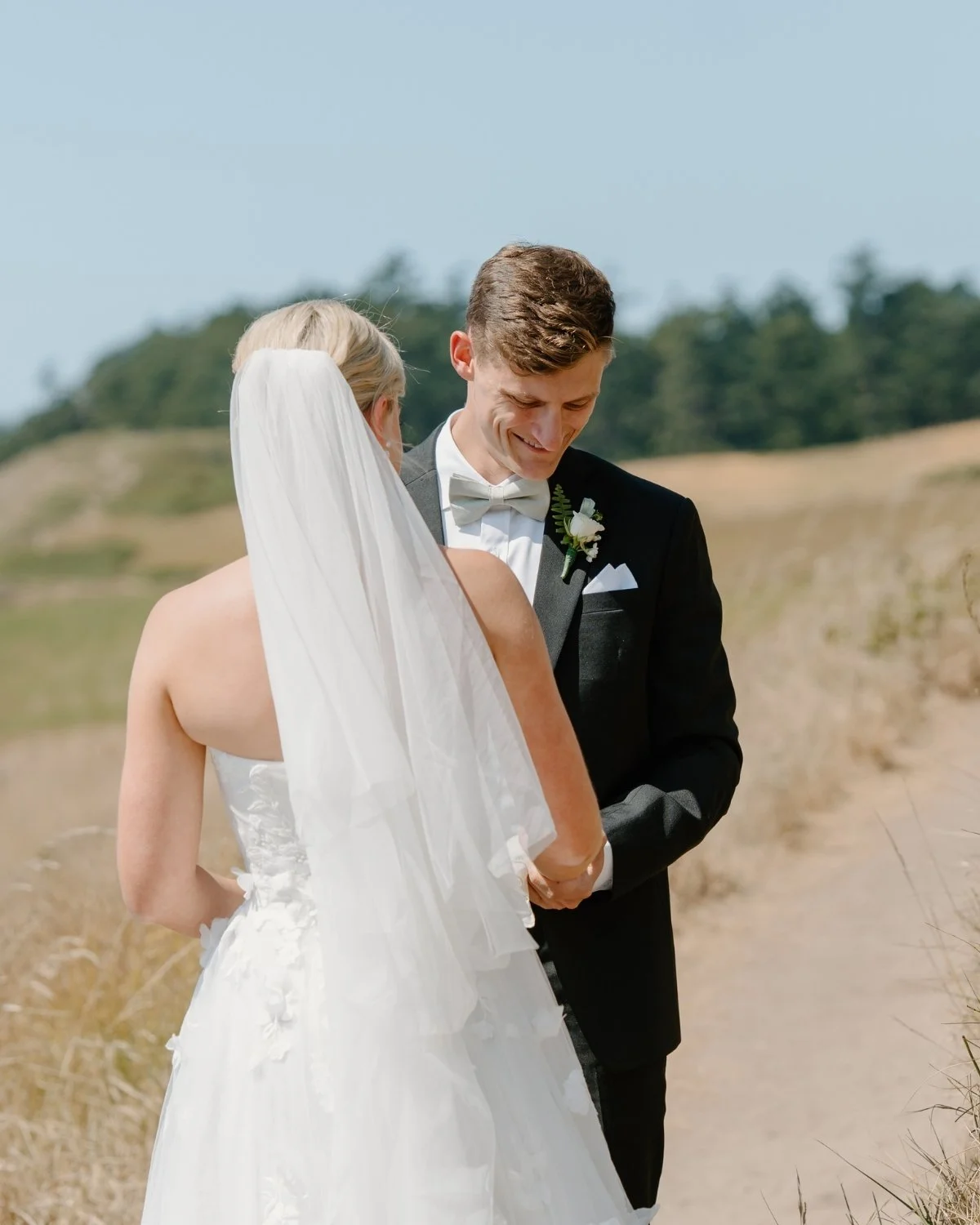 Crockett Farm on Whidbey Island is only a 7-minute drive from Ebey&rsquo;s Landing, so Erin &amp; Keegan chose to have their first look there! They had this moment away from the venue just to themselves, and read their vows in private. It was such a 