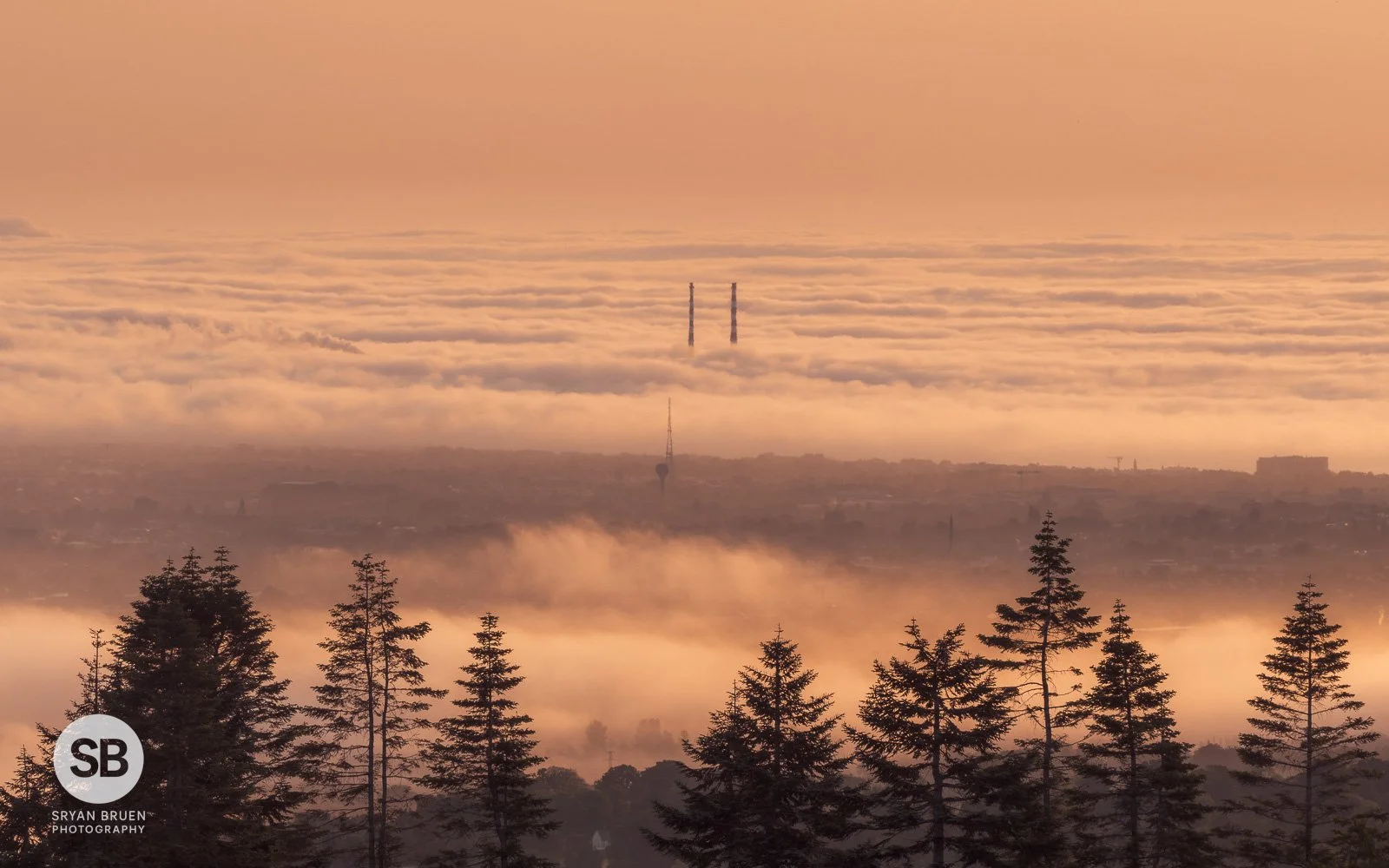 2025-06-19 Poolbeg Chimneys in the fog from Kilakee 19 June 2025.jpg