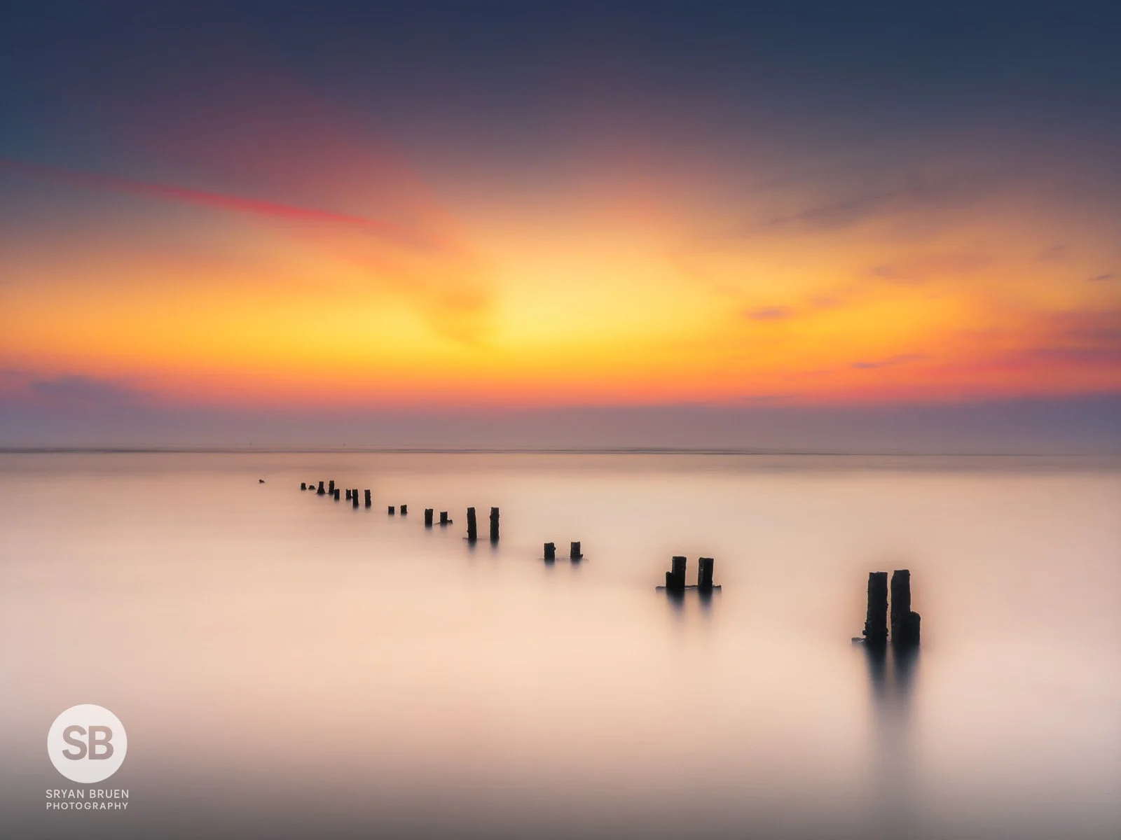 2025-03-09 Malahide Beach groynes sunrise 9 March 2025.jpg