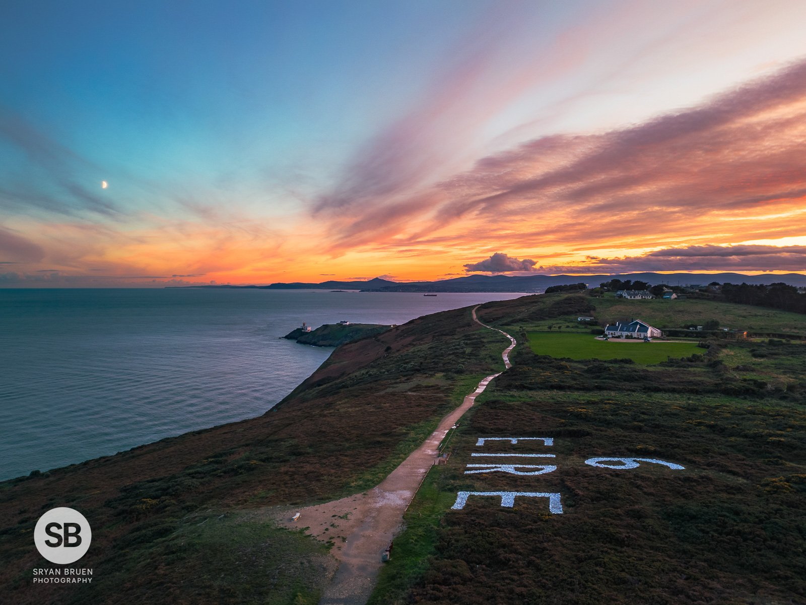 2023-10-21 Howth 6 Eire sunset and half moon 21 October 2023.jpg
