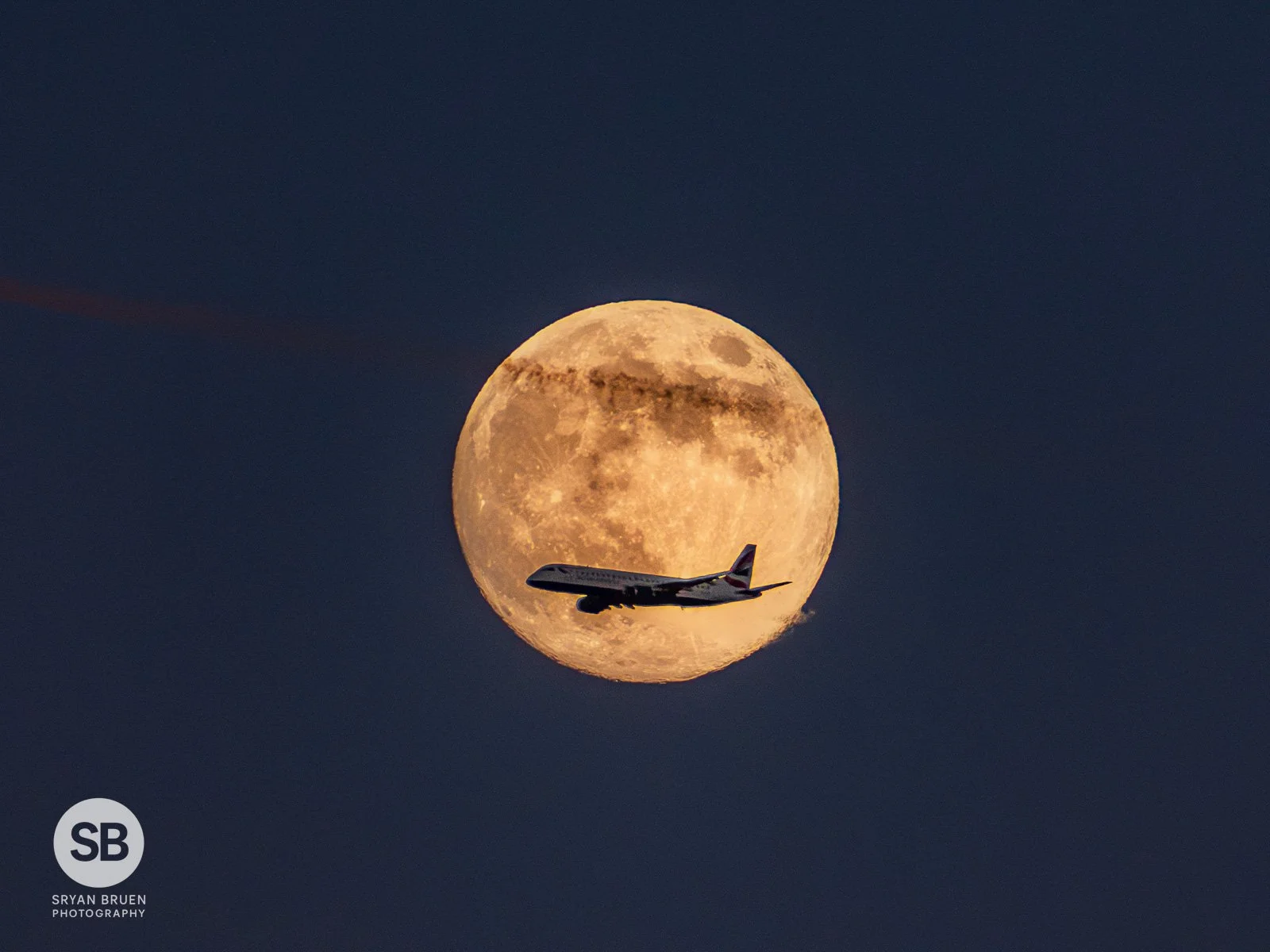 2026-01-02 British Airways crossing the near full moon.jpg