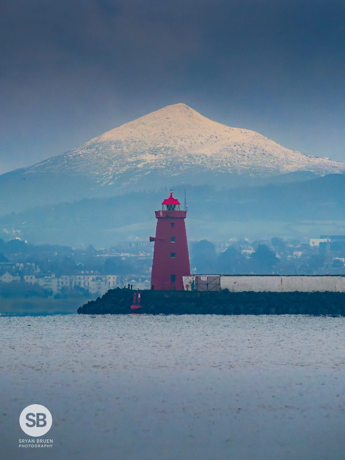 2025-01-08 Poolbeg Lighthouse Sugar Loaf snow 8 January 2025.jpg