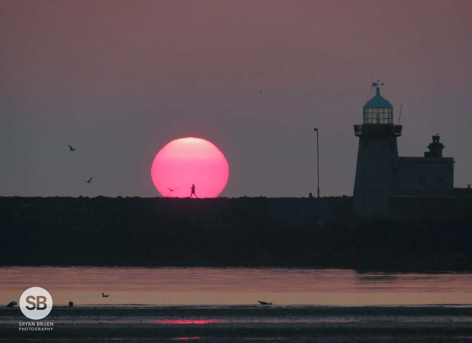 2021-04-15 Howth Lighthouse pink sunrise 15 April 2021.jpg