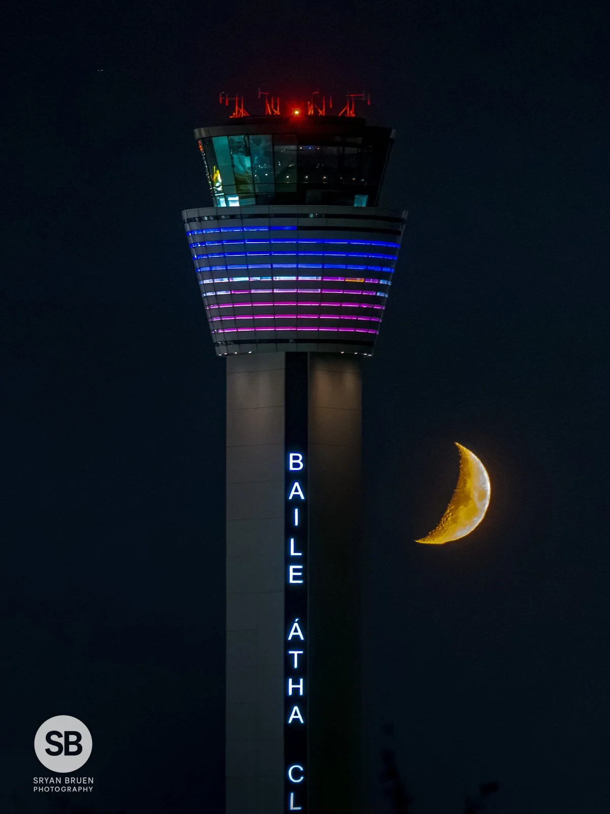 2026-10-16 Dublin Airport air traffic control tower moonset.jpg