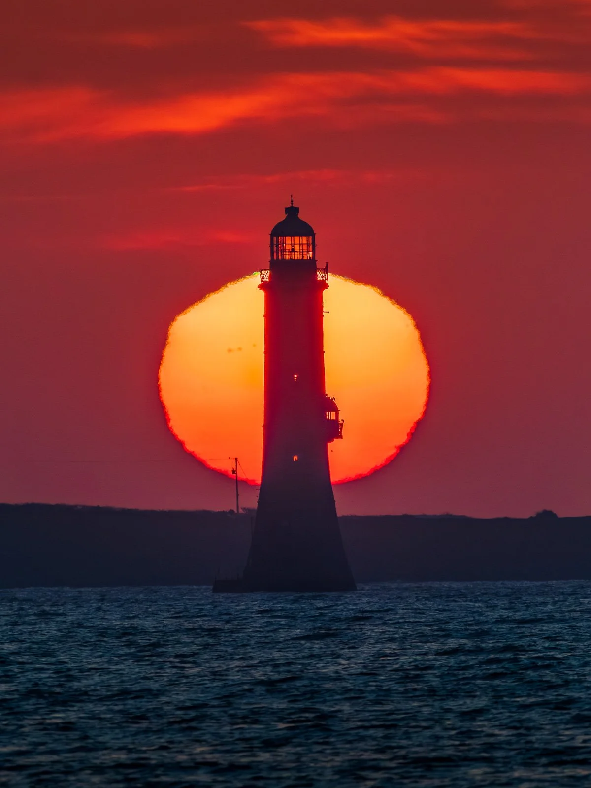 2026-04-24 Haulbowline Lighthouse sunrise alignment.jpg