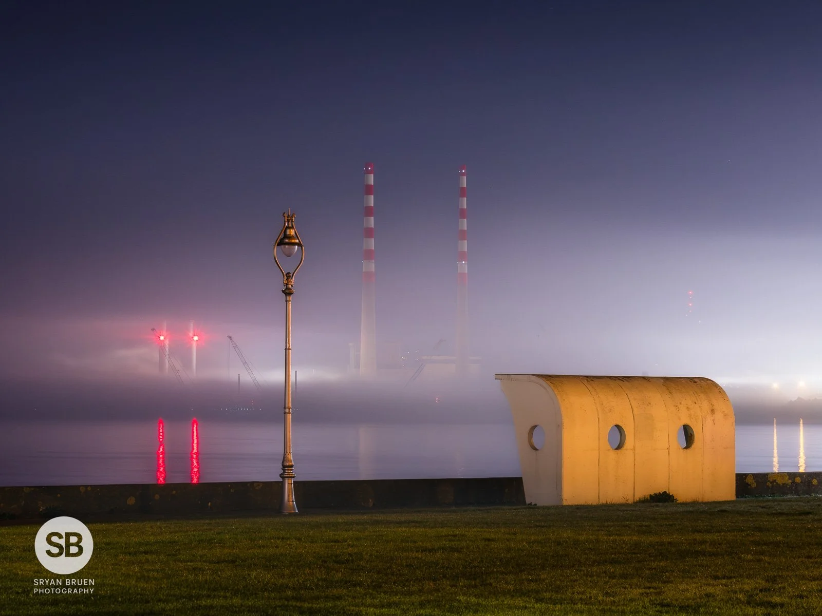 2026-03-20 Poolbeg fog from Clontarf with shelter.jpg