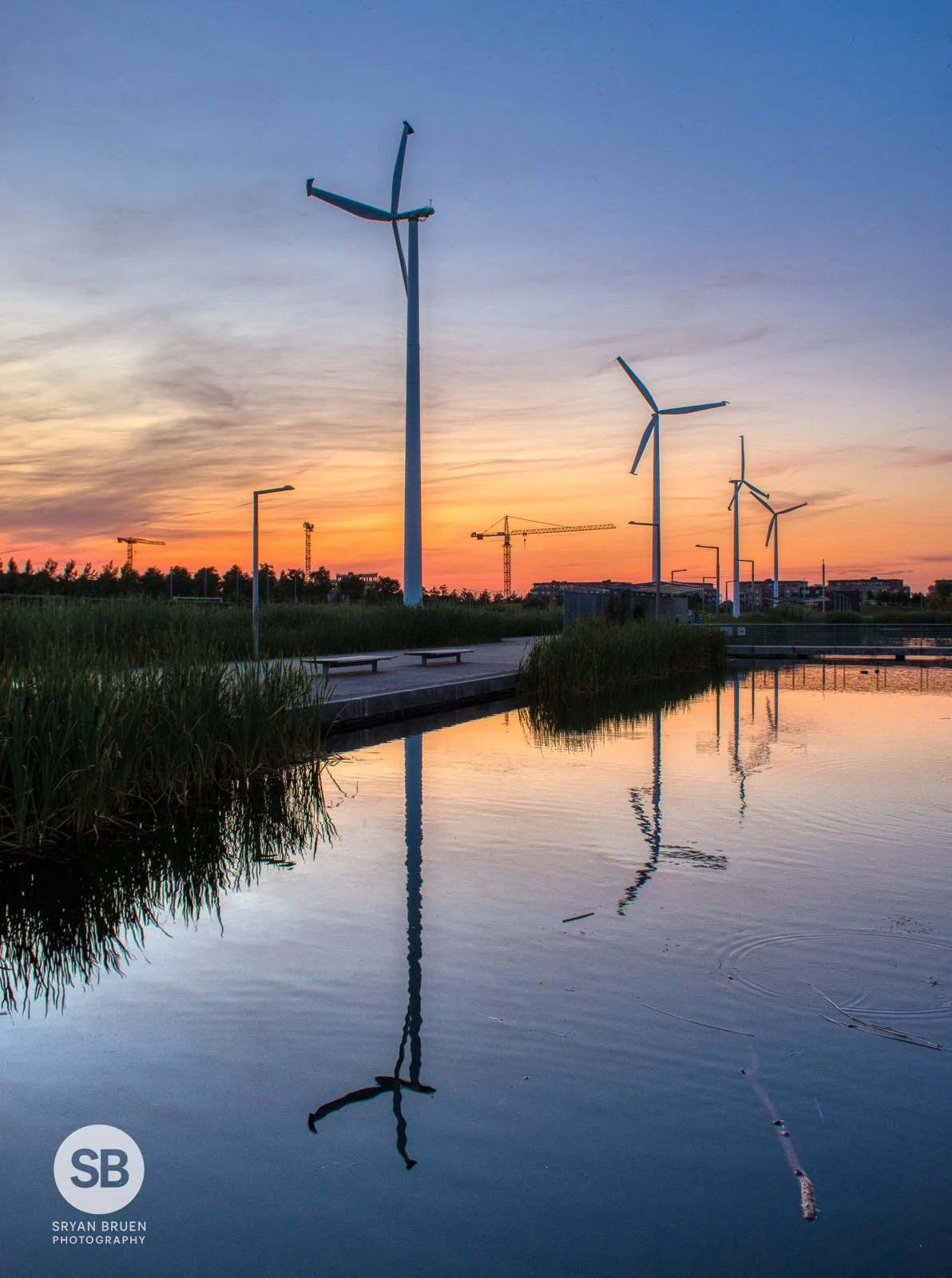 2021-07-21 Father Collins Park sunset turbine reflections 21 July 2021.jpg
