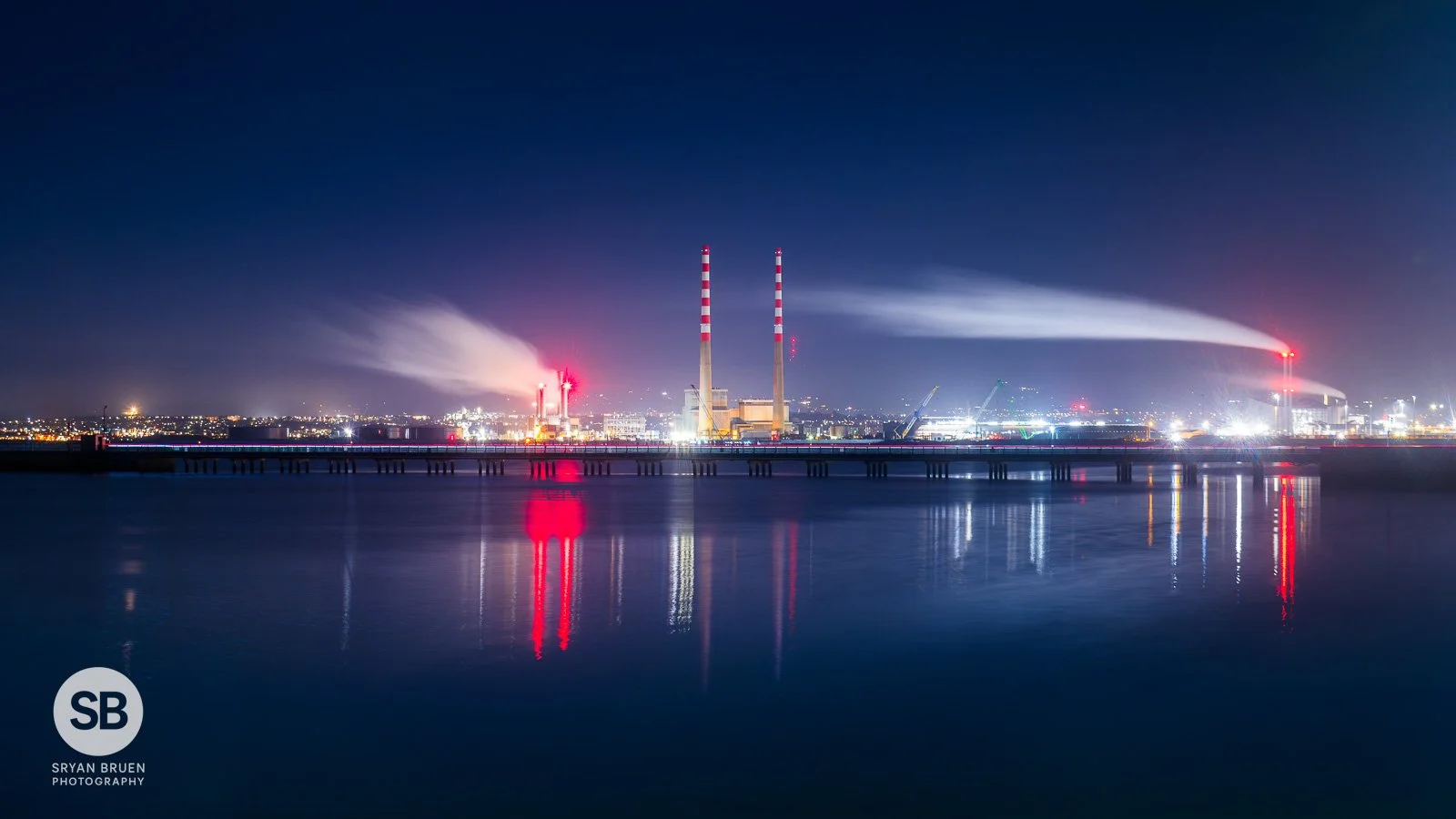 2025-12-15 Clontarf Wooden Bridge night reflections and light trail.jpg