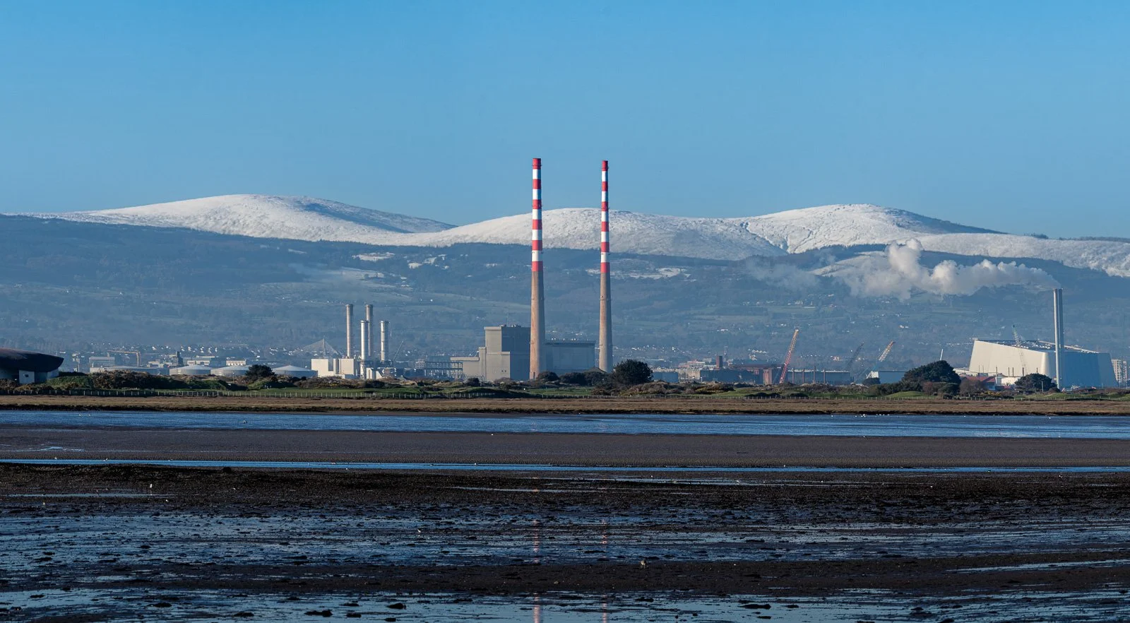 2026-03-06 Poolbeg Wicklow Mountains snow pano from Bayside.jpg