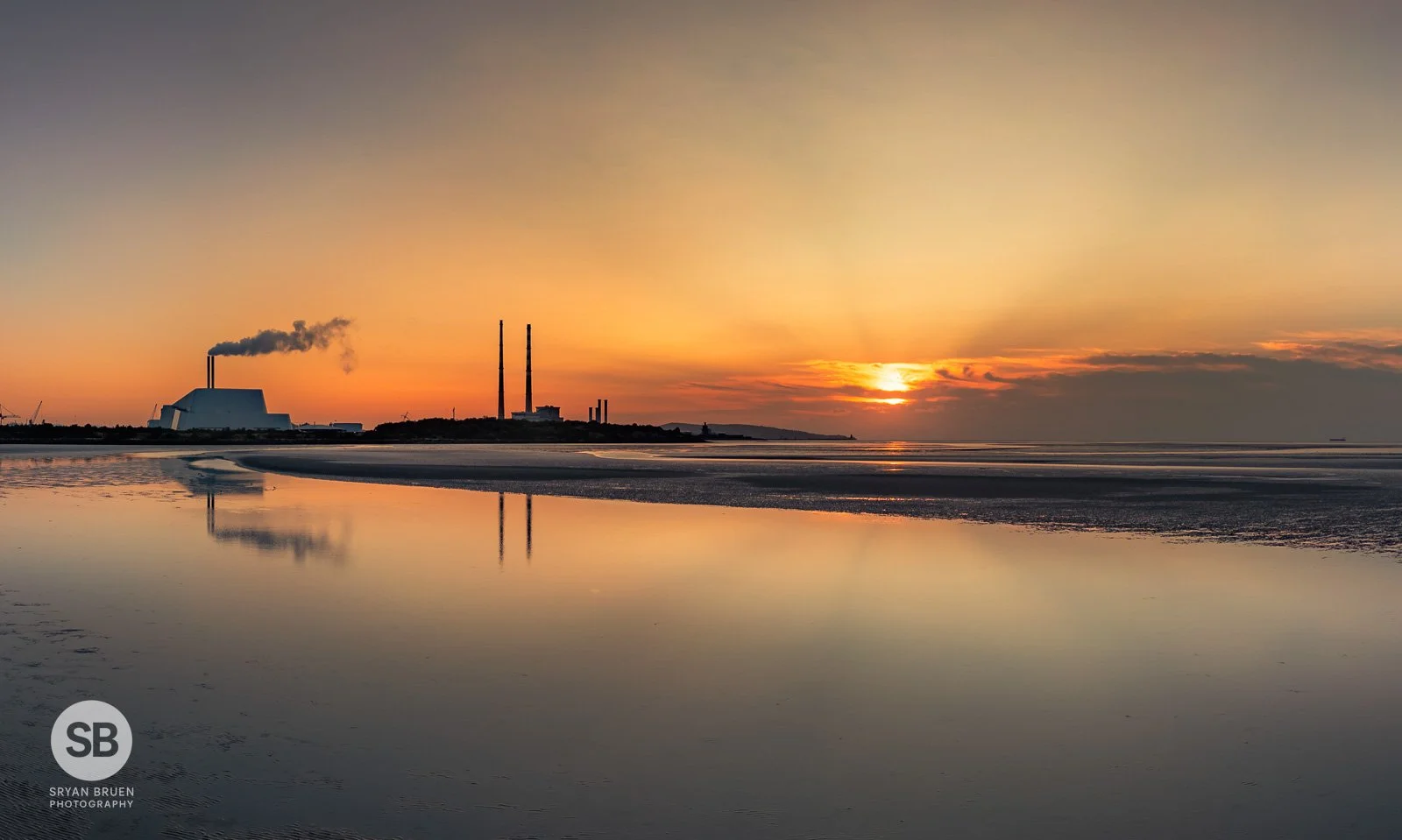 2024-08-24 Sunrise reflections and crepuscular rays on Sandymount Strand 24 August 2024.jpg