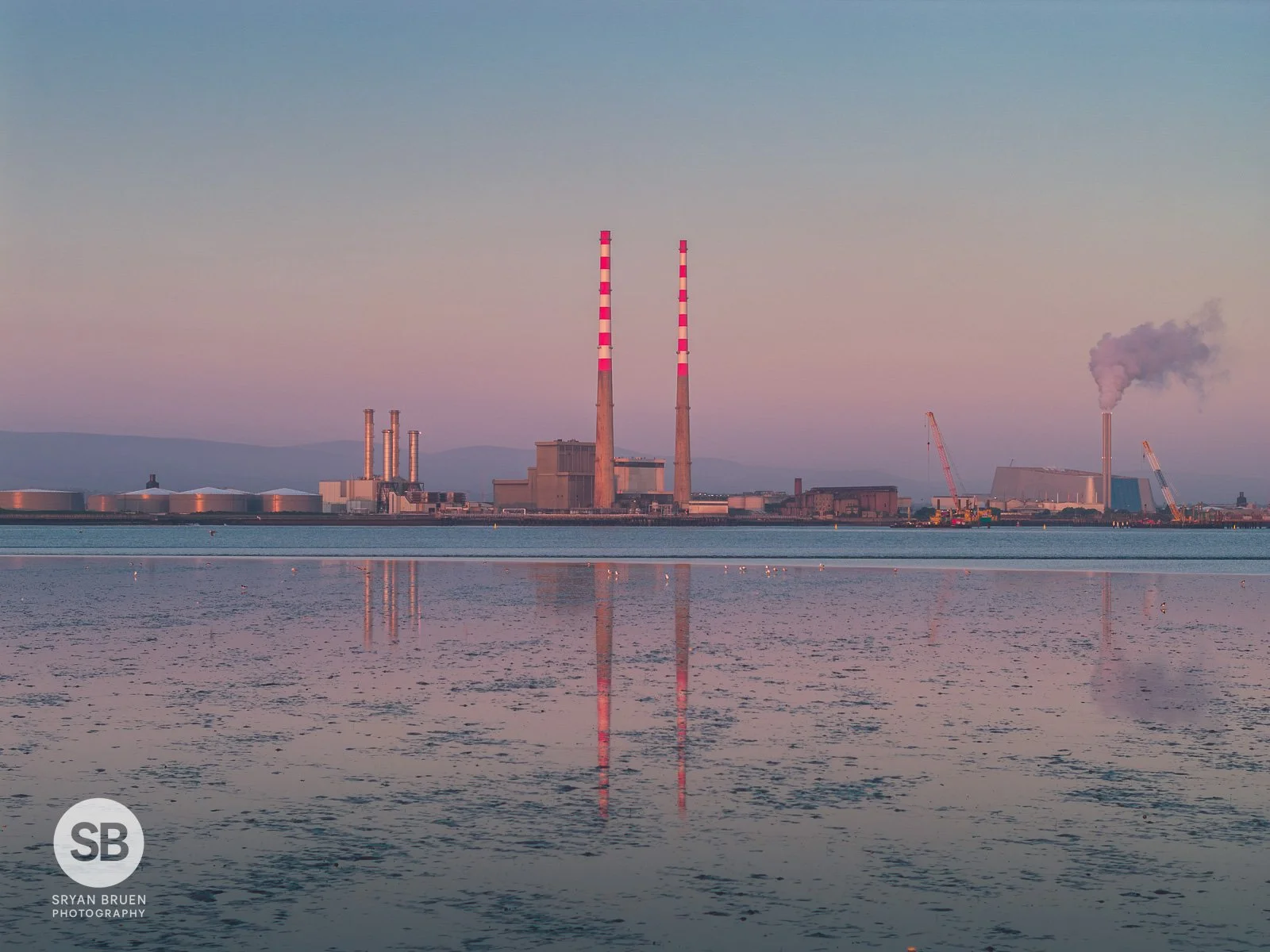 2025-05-13 Poolbeg Chimneys reflections at sunrise from Bull Wall 13 May 2025.jpg